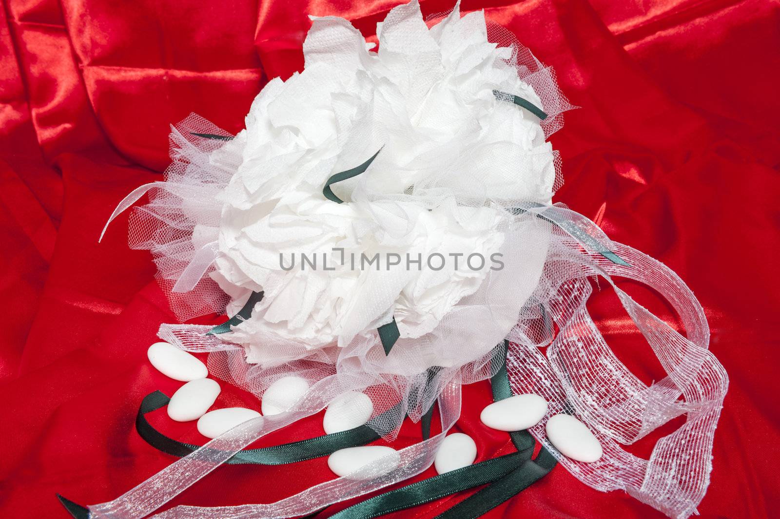  wedding rings on  a colorful fabric background