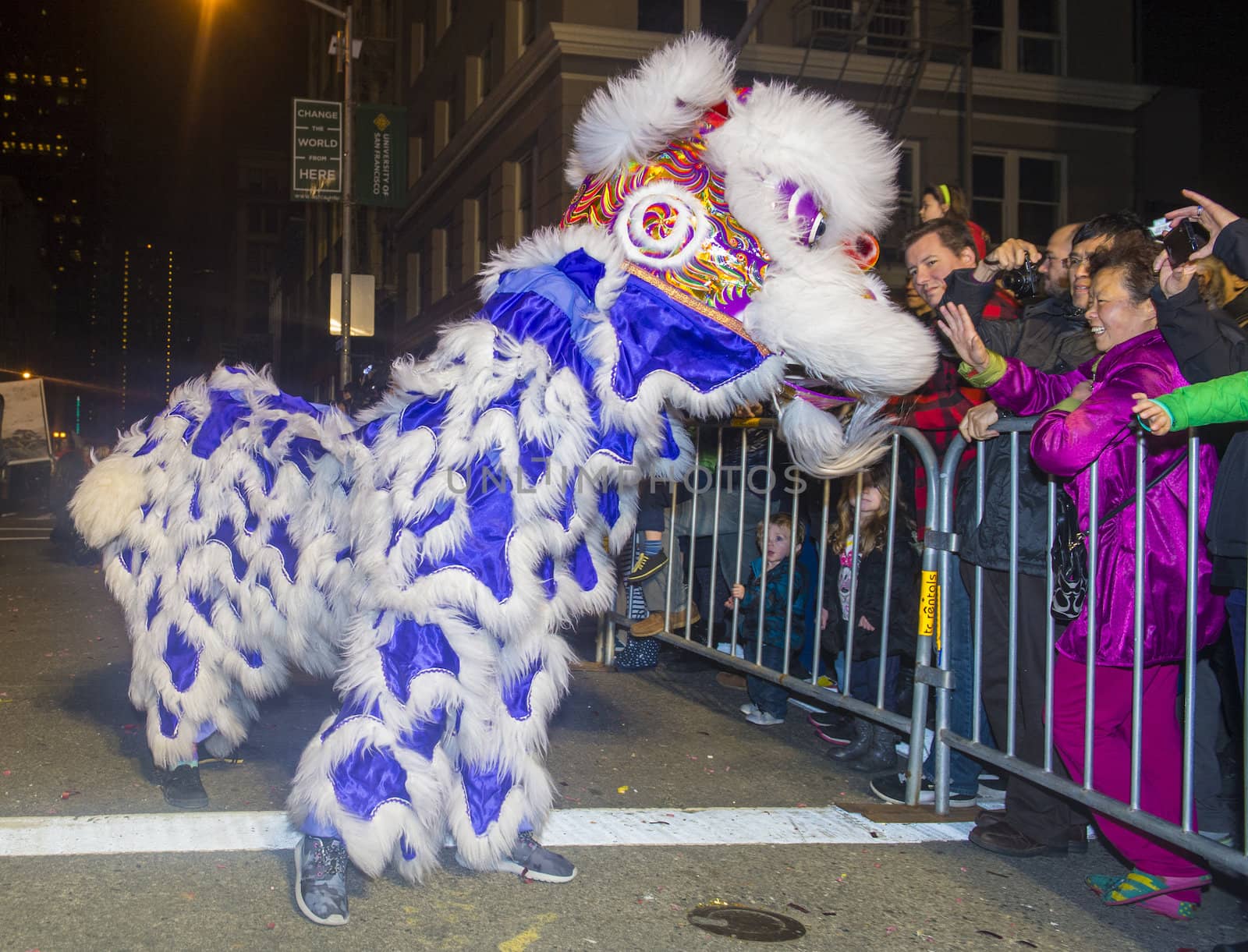 SAN FRANCISCO - FEB 15 : An unidentified participants in a Lion dance at the Chinese New Year Parade in San Francisco , California on February 15 2014 , It is the largest Asian event in North America 