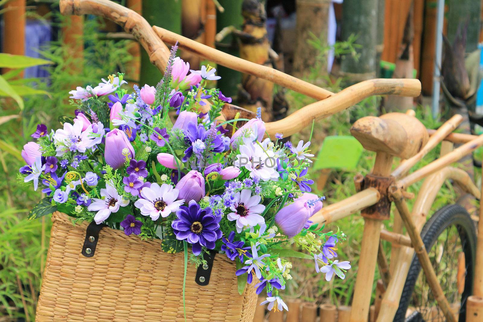 Flower basket on bamboo bike by foto76
