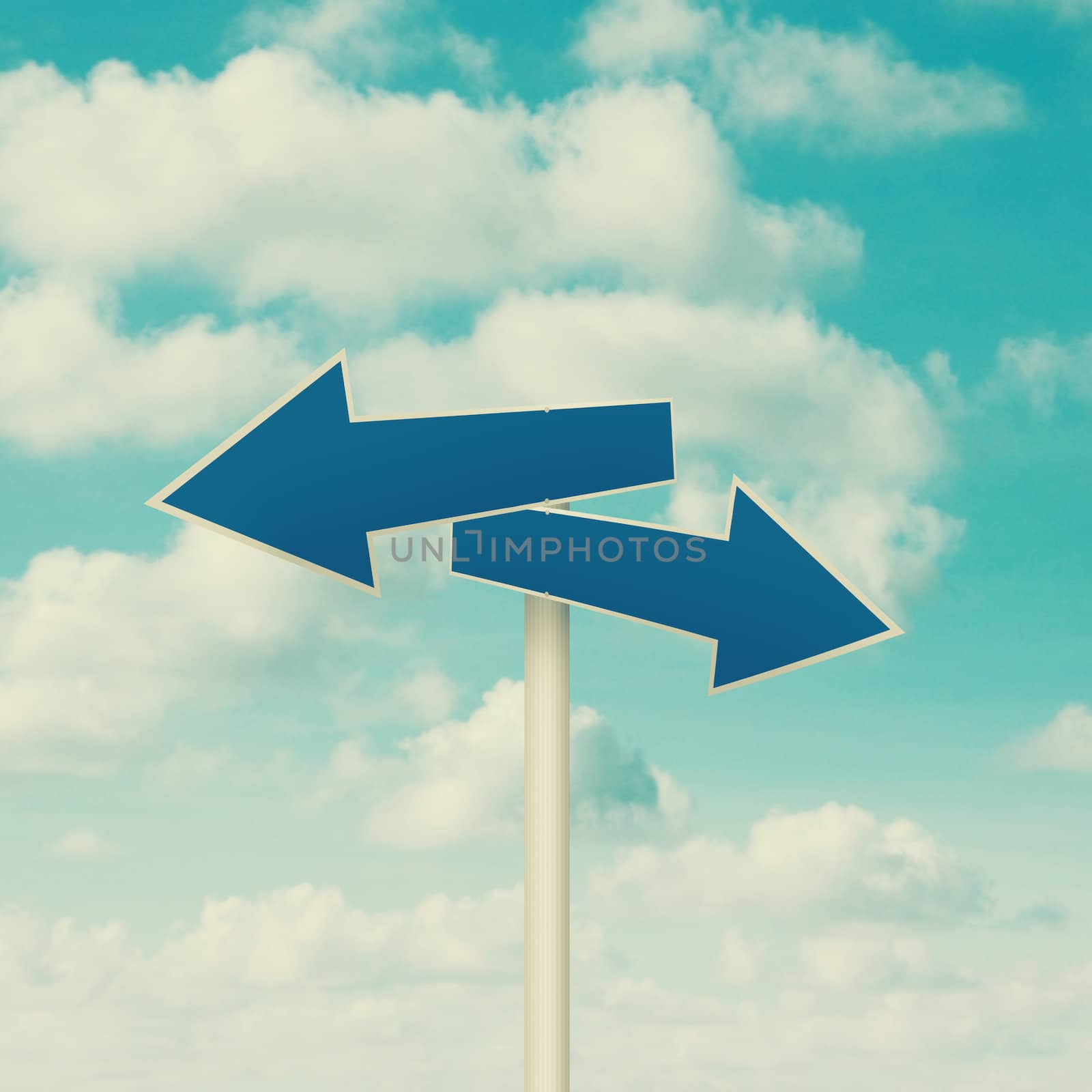 Two blank road signs pointing in opposite directions, blue sky background in vintage tone.