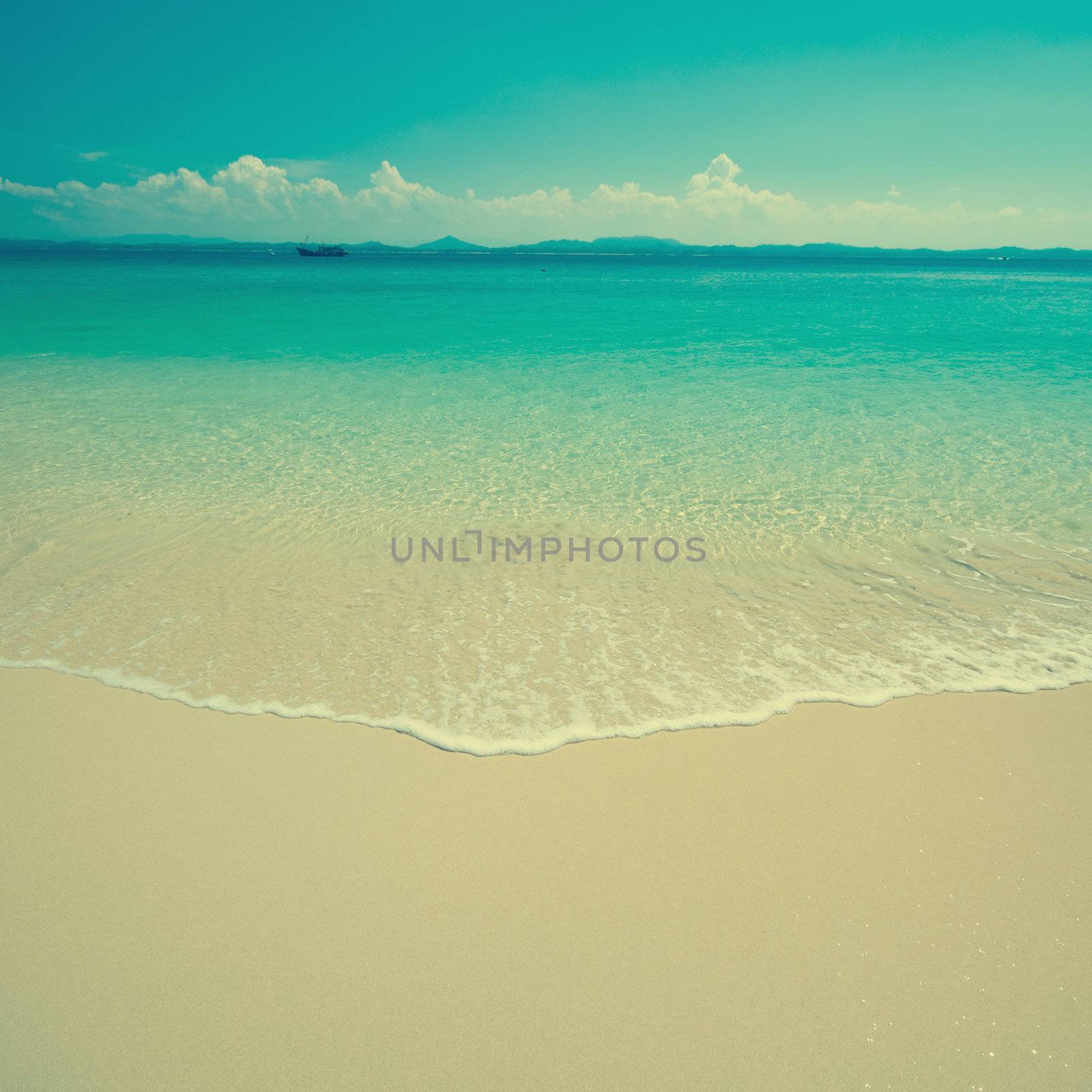 Vintage beach scene in hot day, tropical island Malaysia.