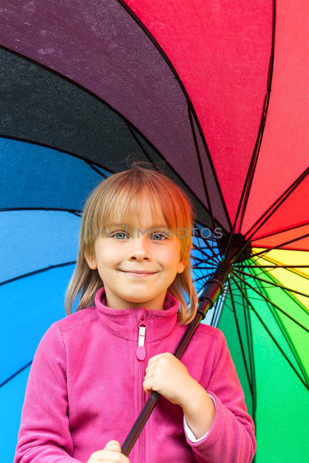 Child with umbrella by naumoid