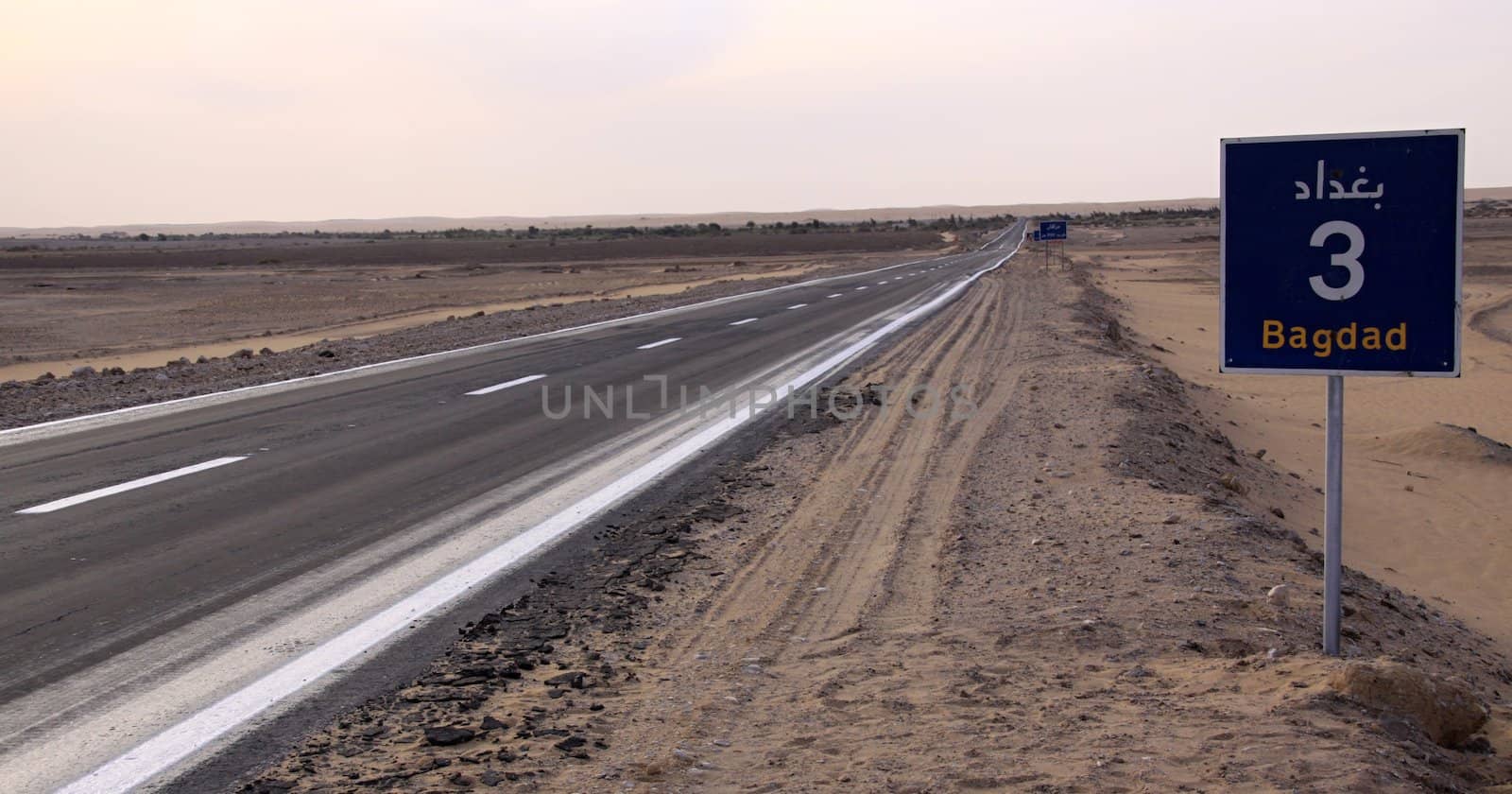 Road in desert to Bagdad by jnerad