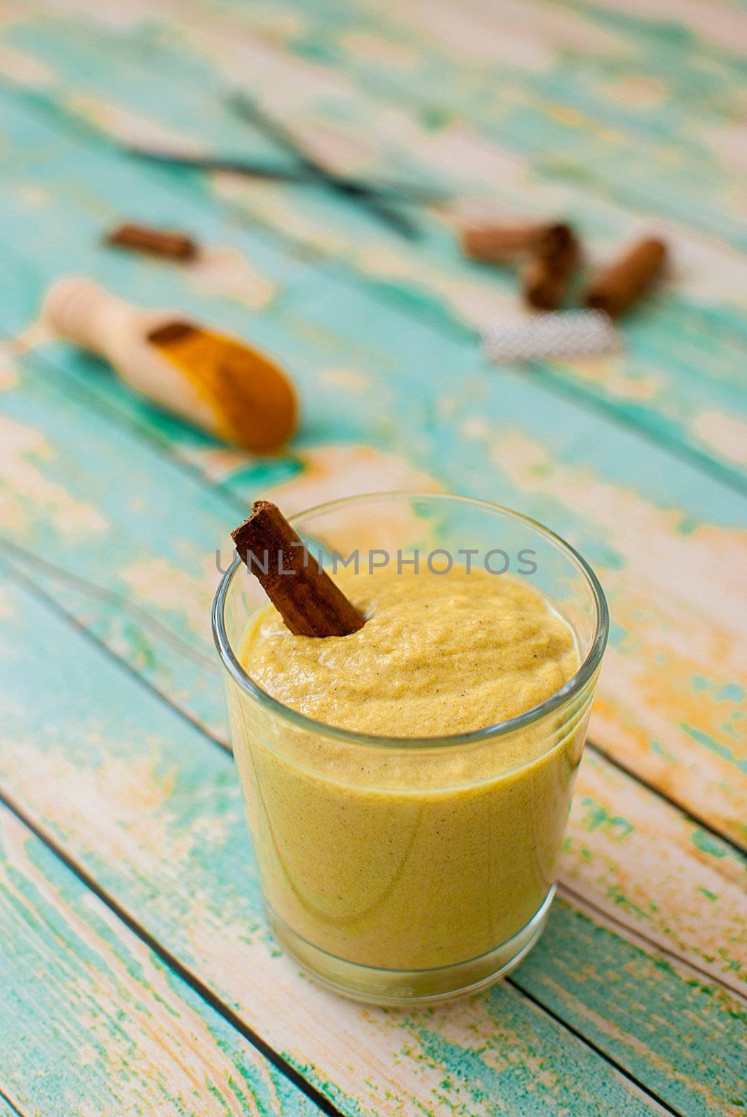 healthy smoothie with turmeric, vanilla, cinnamon and coconut milk