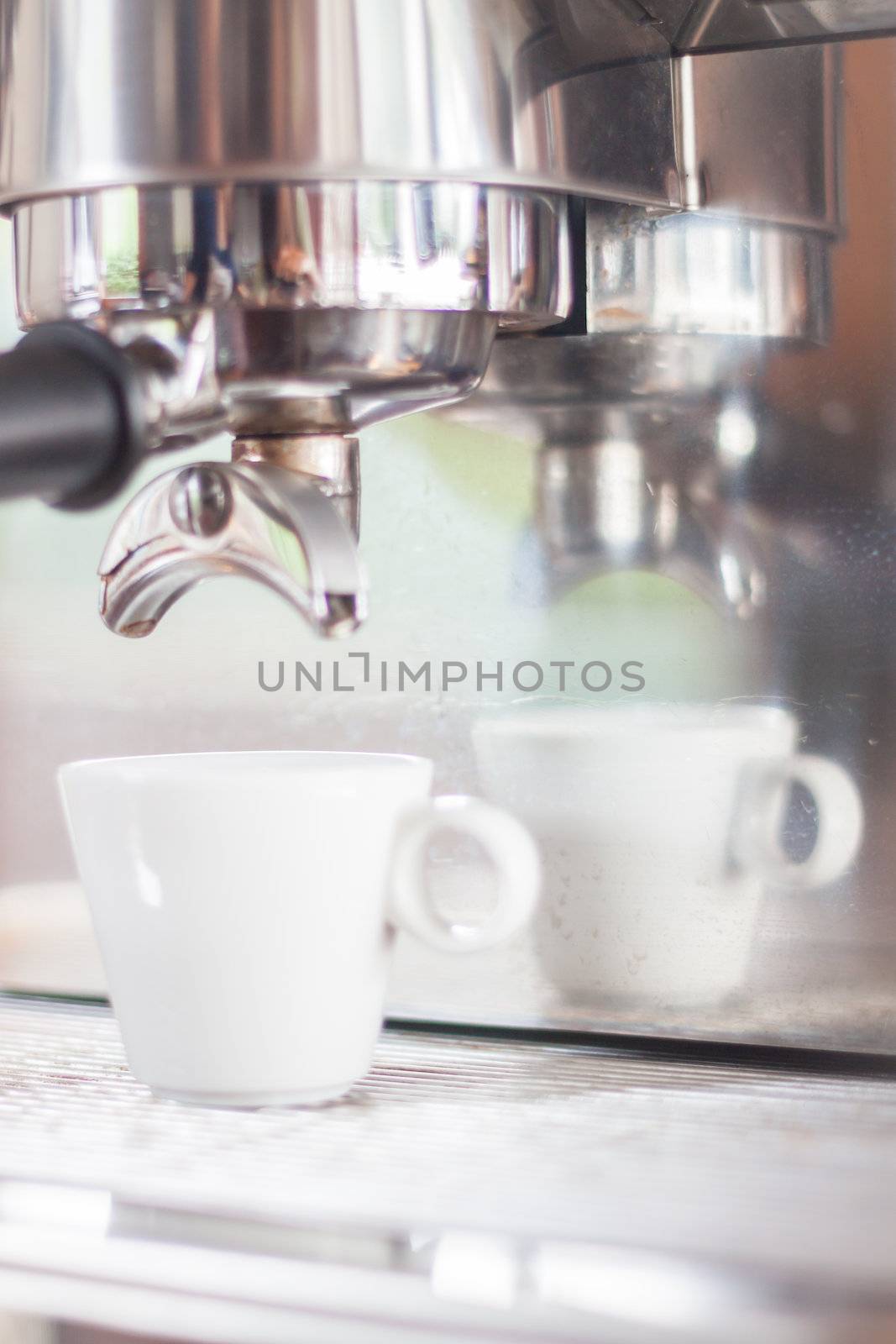 Espresso shot in white cup, stock photo