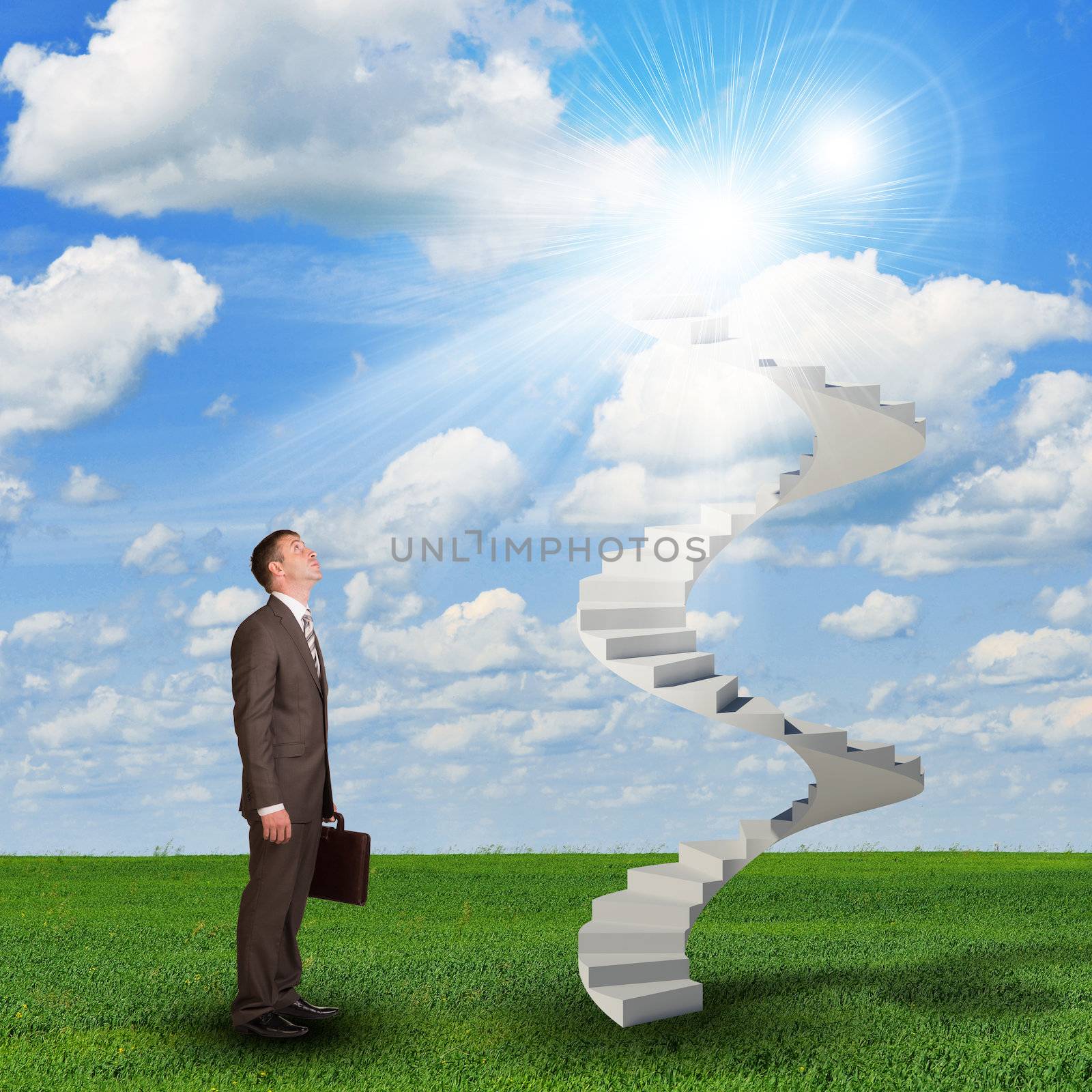 Businessman looking to stairs in sky by cherezoff
