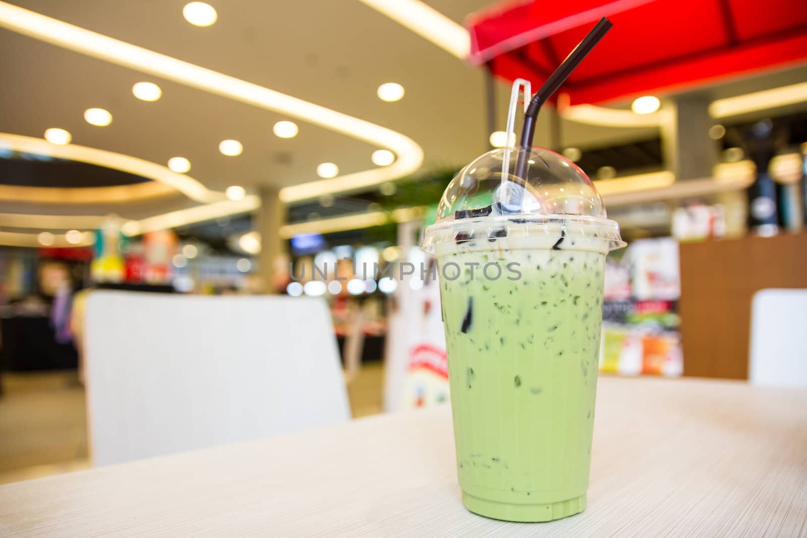 Ice milk green tea with grass jelly topping