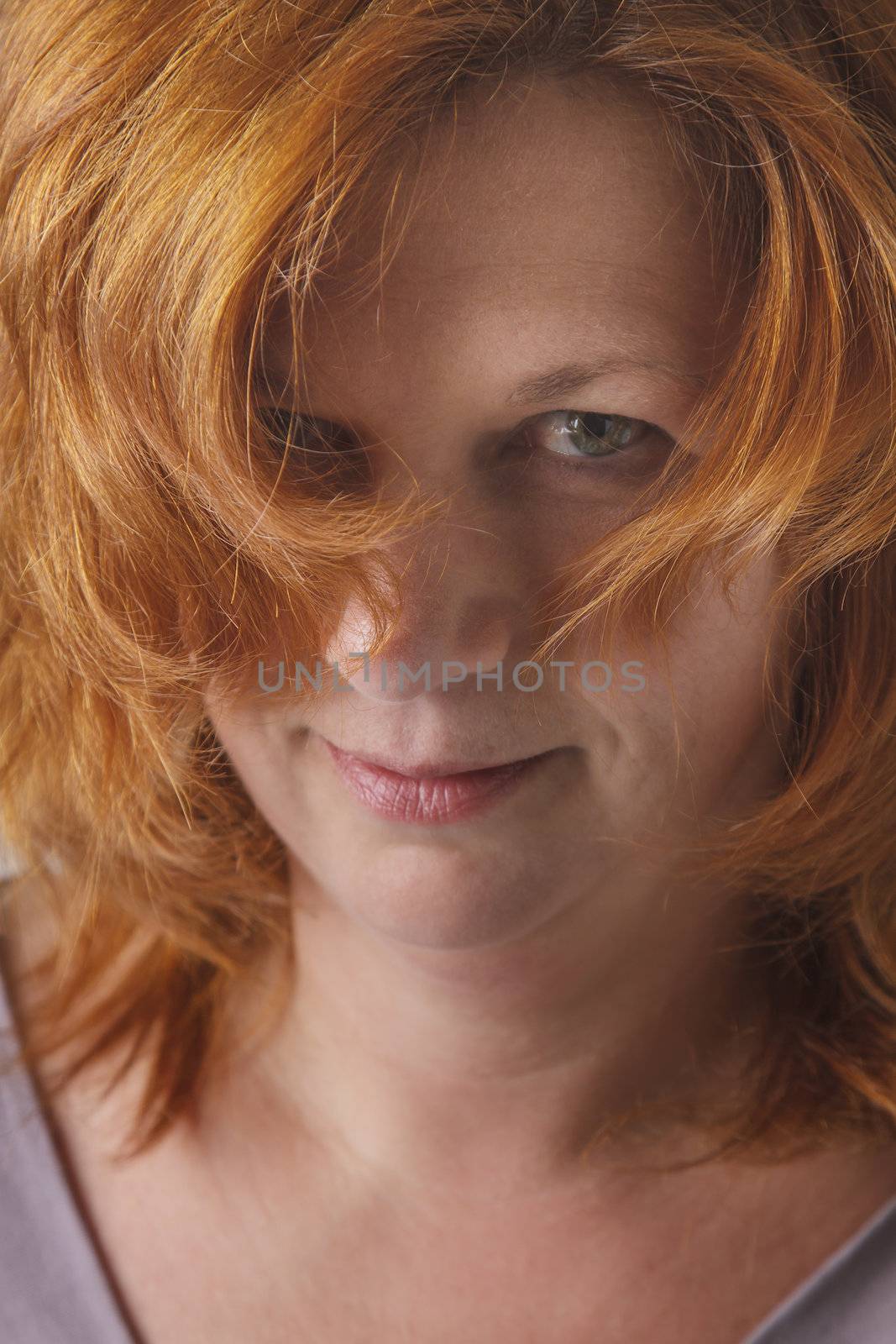 red hair woman with sexy look into her eyes