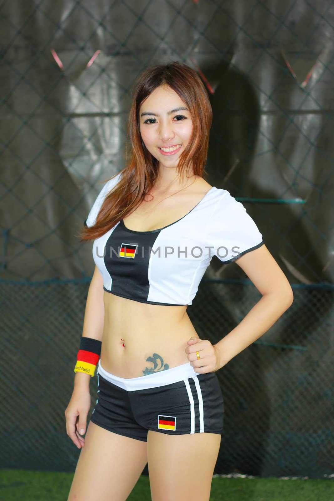 BANGKOK, THAILAND - JUNE 29, 2014: Unidentified model with Germany  costume pose for promote World Cup 2014 in futsal park on June 29, 2014 in Bangkok, Thailand.