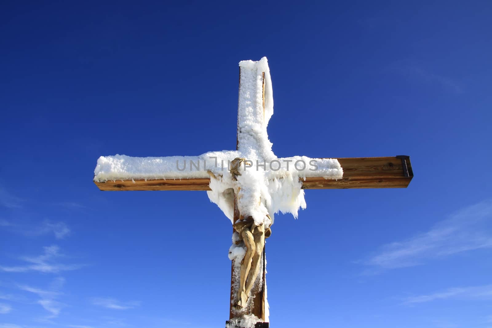 The cross on high point in Swiss Alps by jnerad