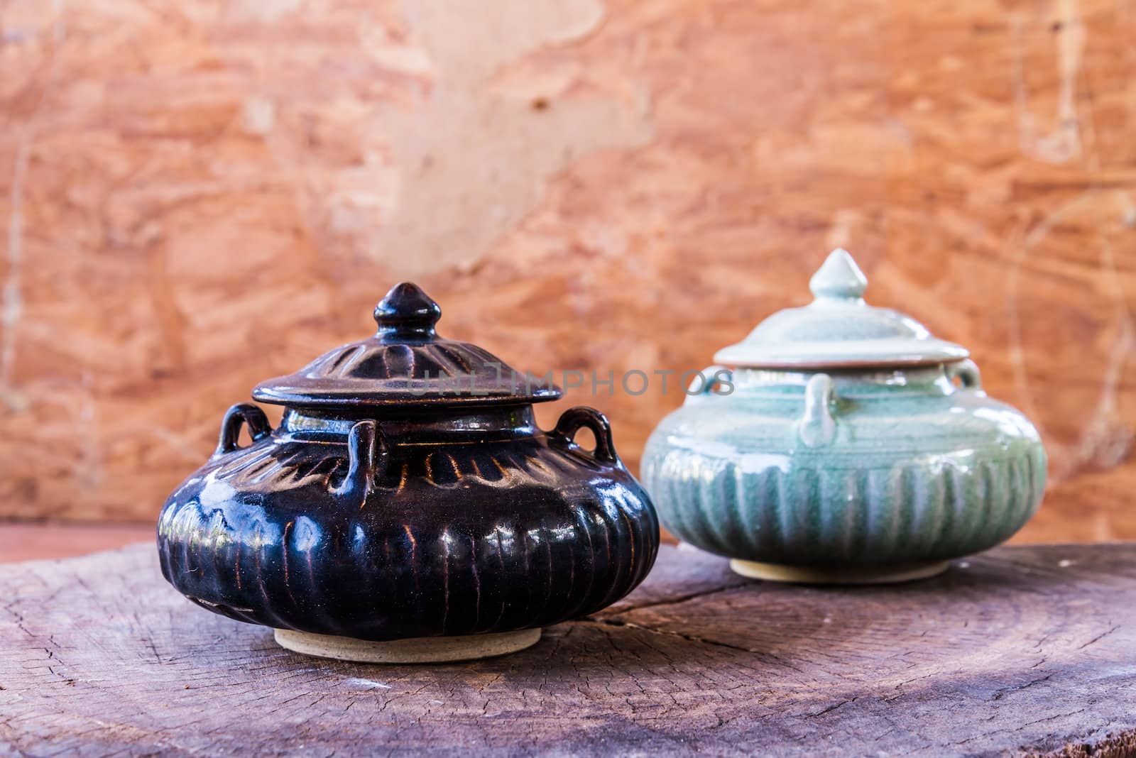 vintage ceramic pot on wood