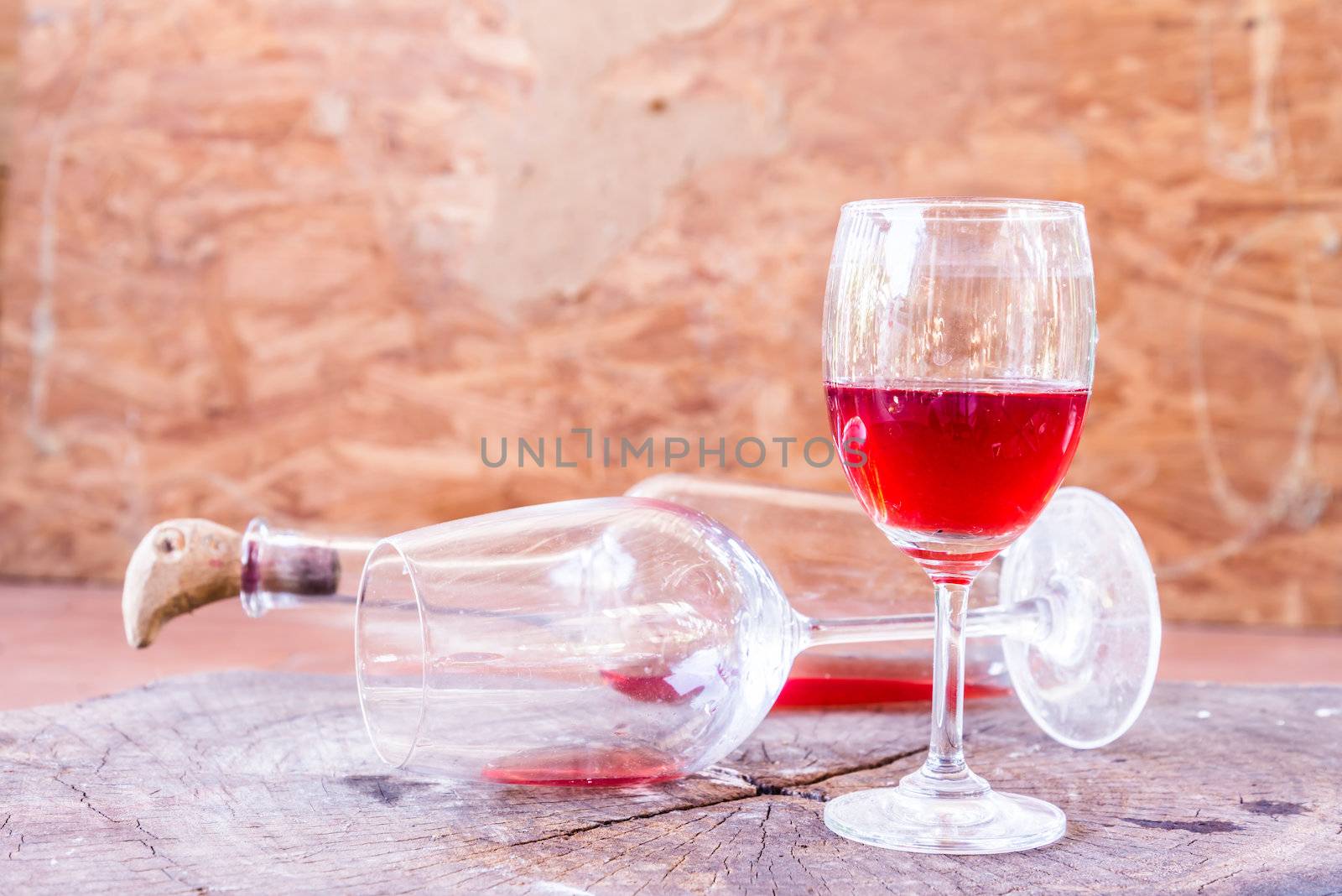 red wine on wooden background still life image