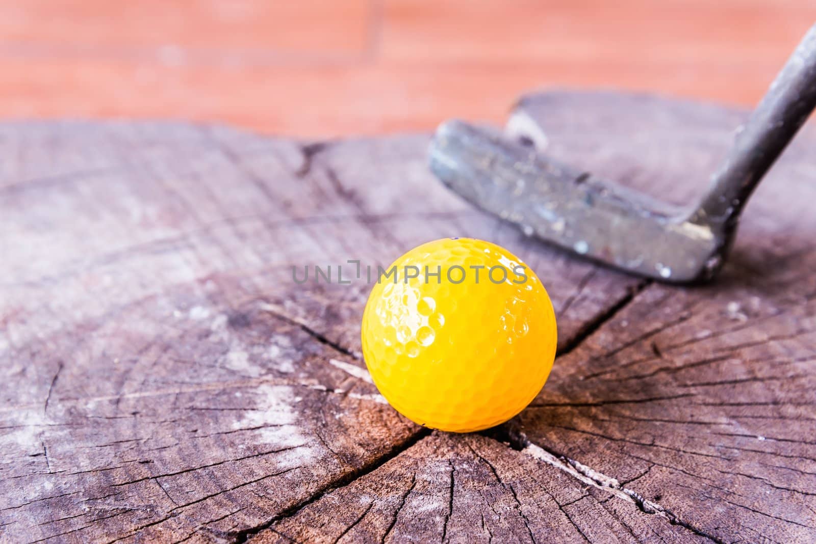 Still life Yellow Miniature Golf Ball On White Background.