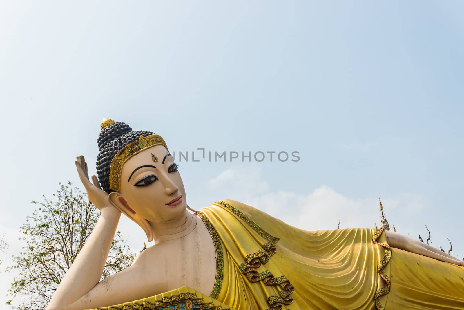 Reclining image of Buddha  by wmitrmatr