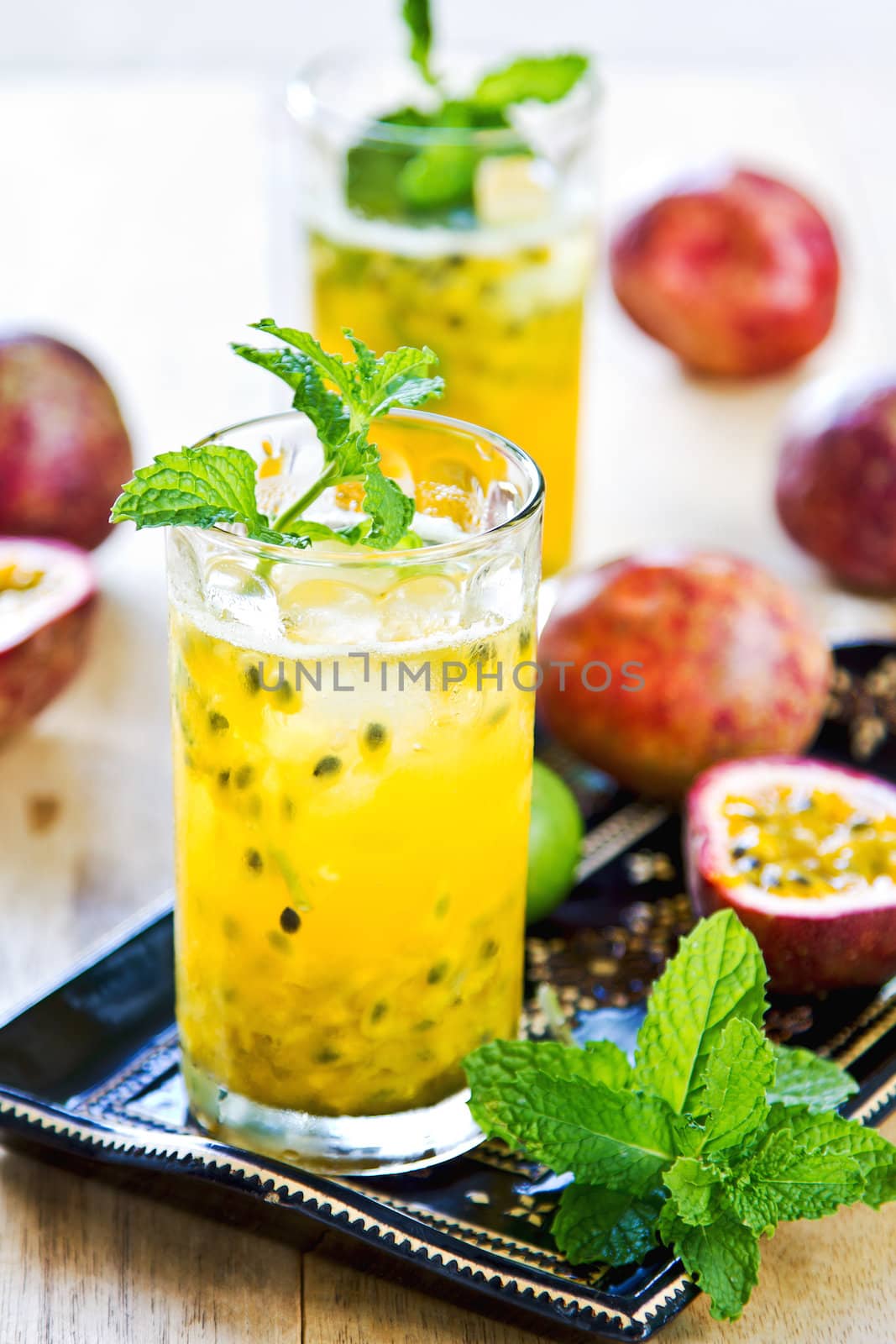 Fresh Passion fruit with Lychee and Lime Mojito