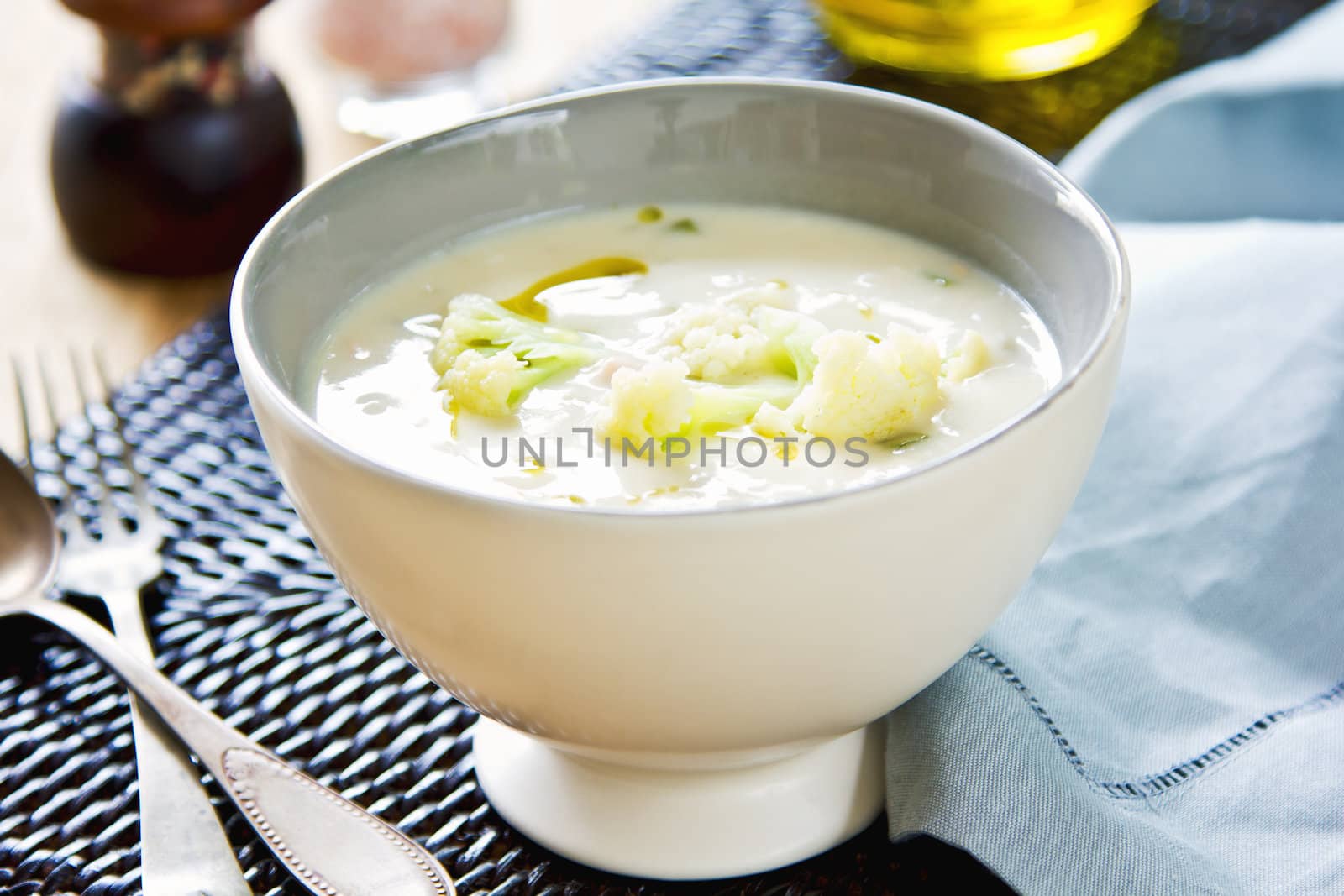 Cauliflower soup with some Cauliflower in a bowl