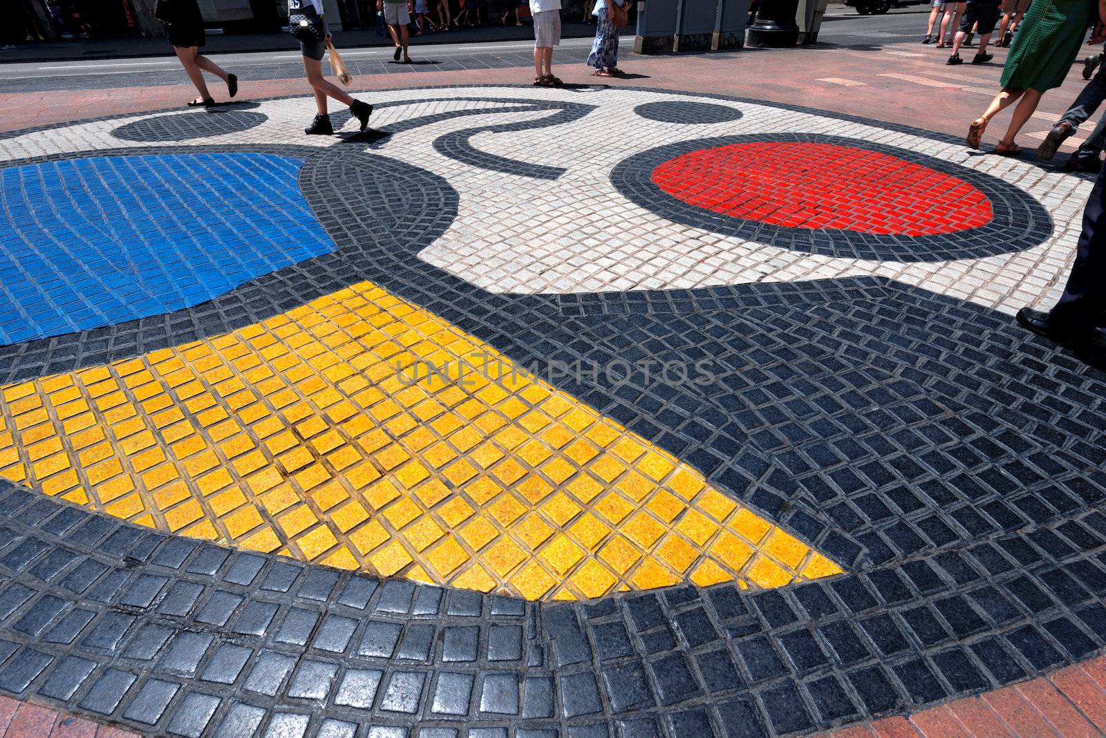 Mosaic del Pla de l'Os by Joan Miro in the middle of the Rambla, the most important road in Barcelona, Catalonia, Spain