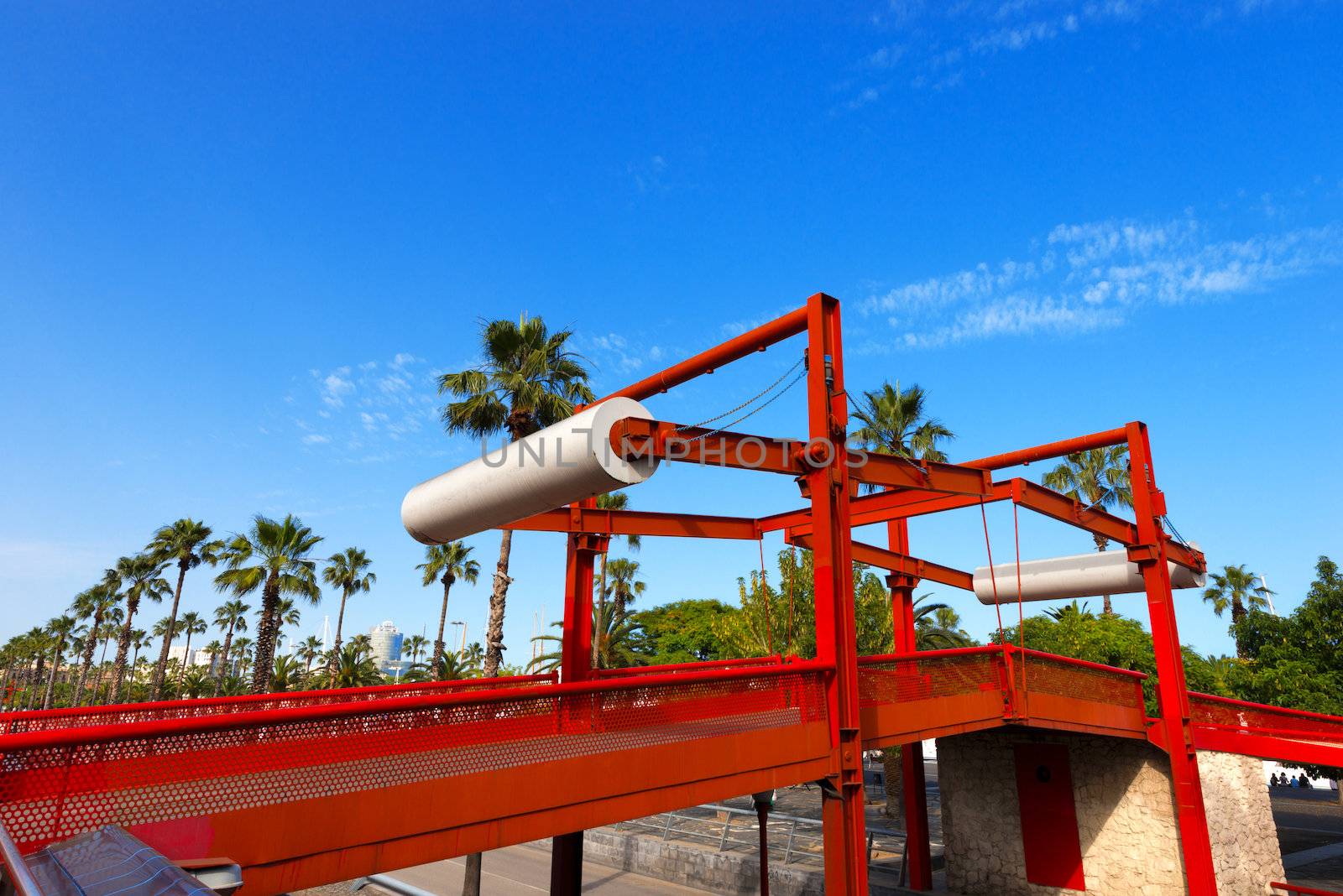 Red movable bridge in Road Litoral to pedestrian and cyclist use. Barcelona, Catalonia, Spain