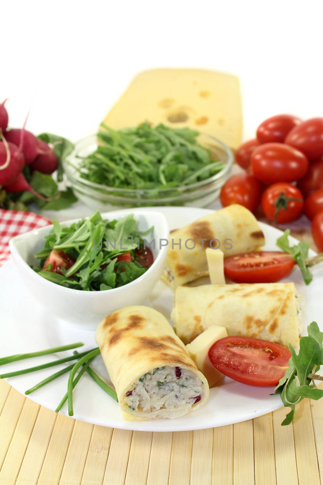 a crepe stuffed with cheese, radishes and chives