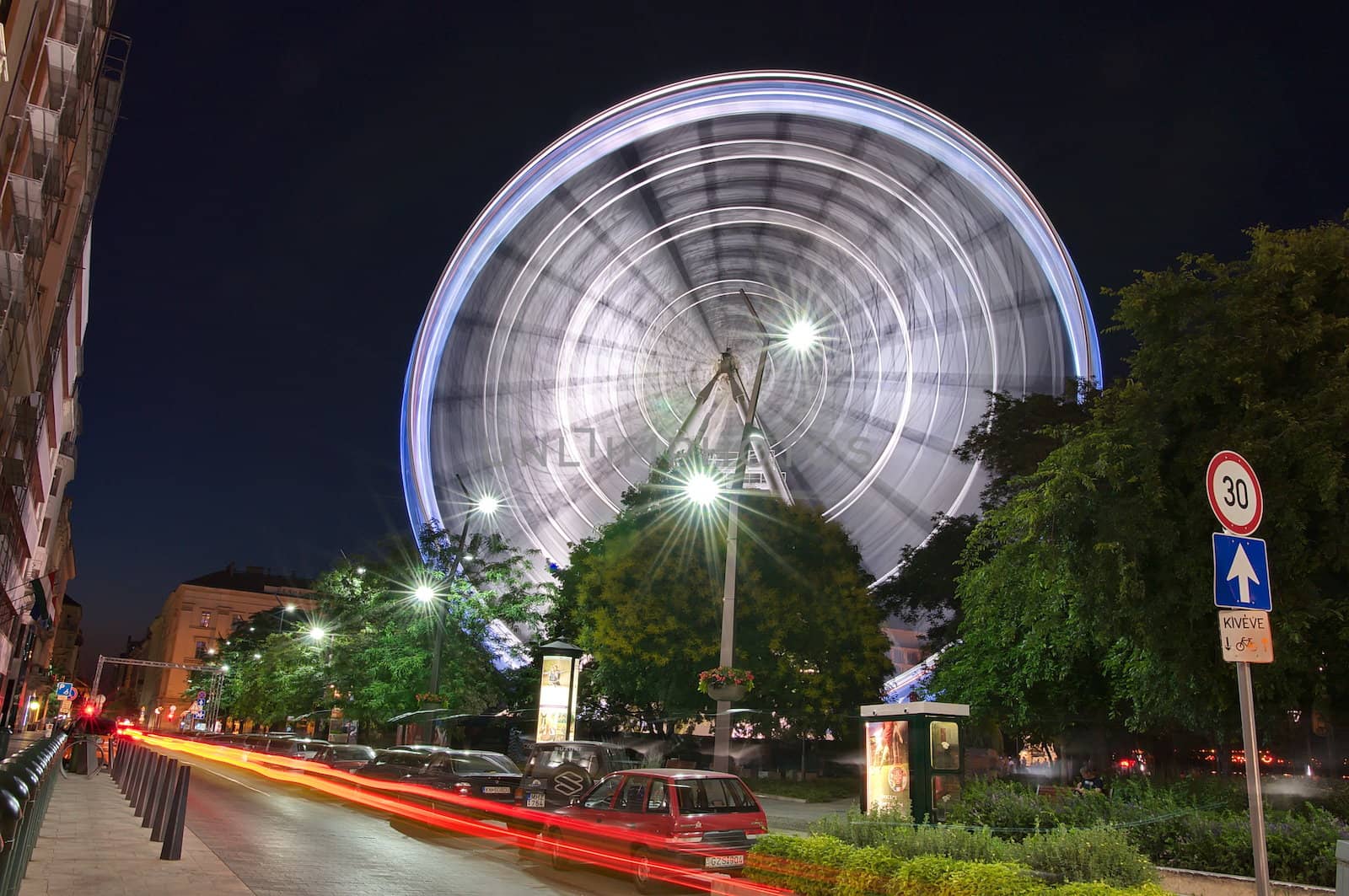 Big wheel spinning at night by anderm