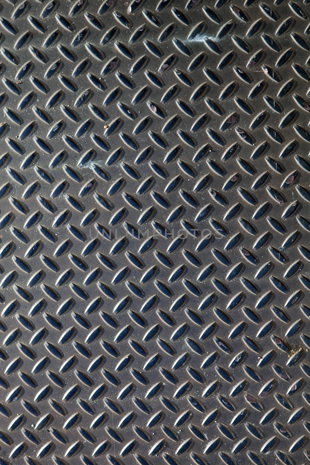 Closeup of real diamond plate metal material. This is the real thing and not an illustration.