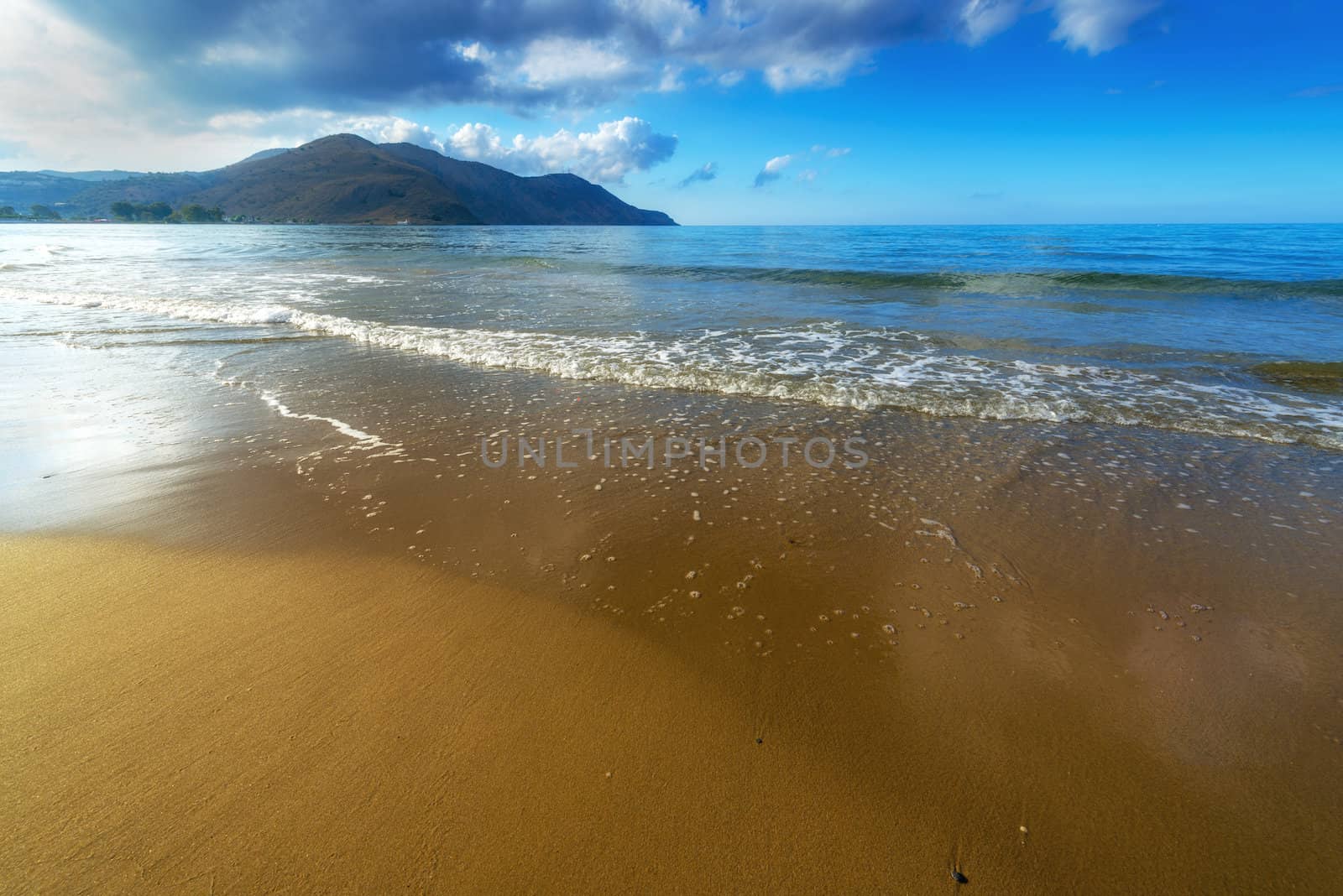 Sandy Beach  With Blue Sky In Georgioupolis, Island Crete, Greece