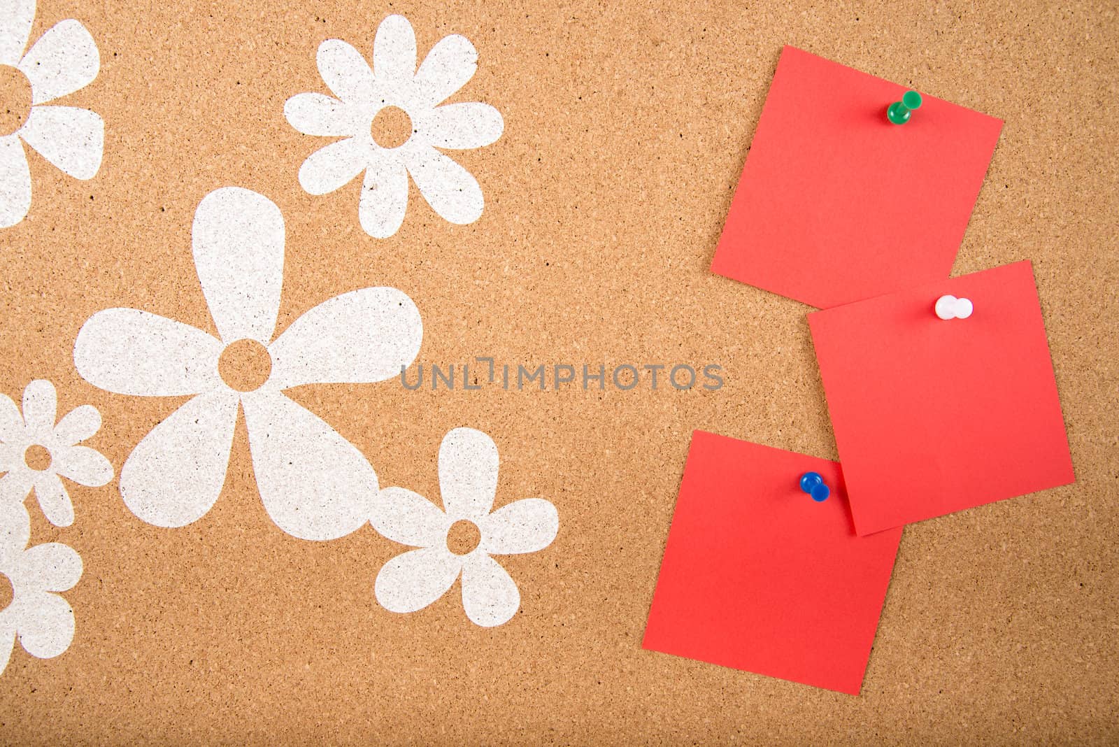 Color sticky memo note cards on cork board