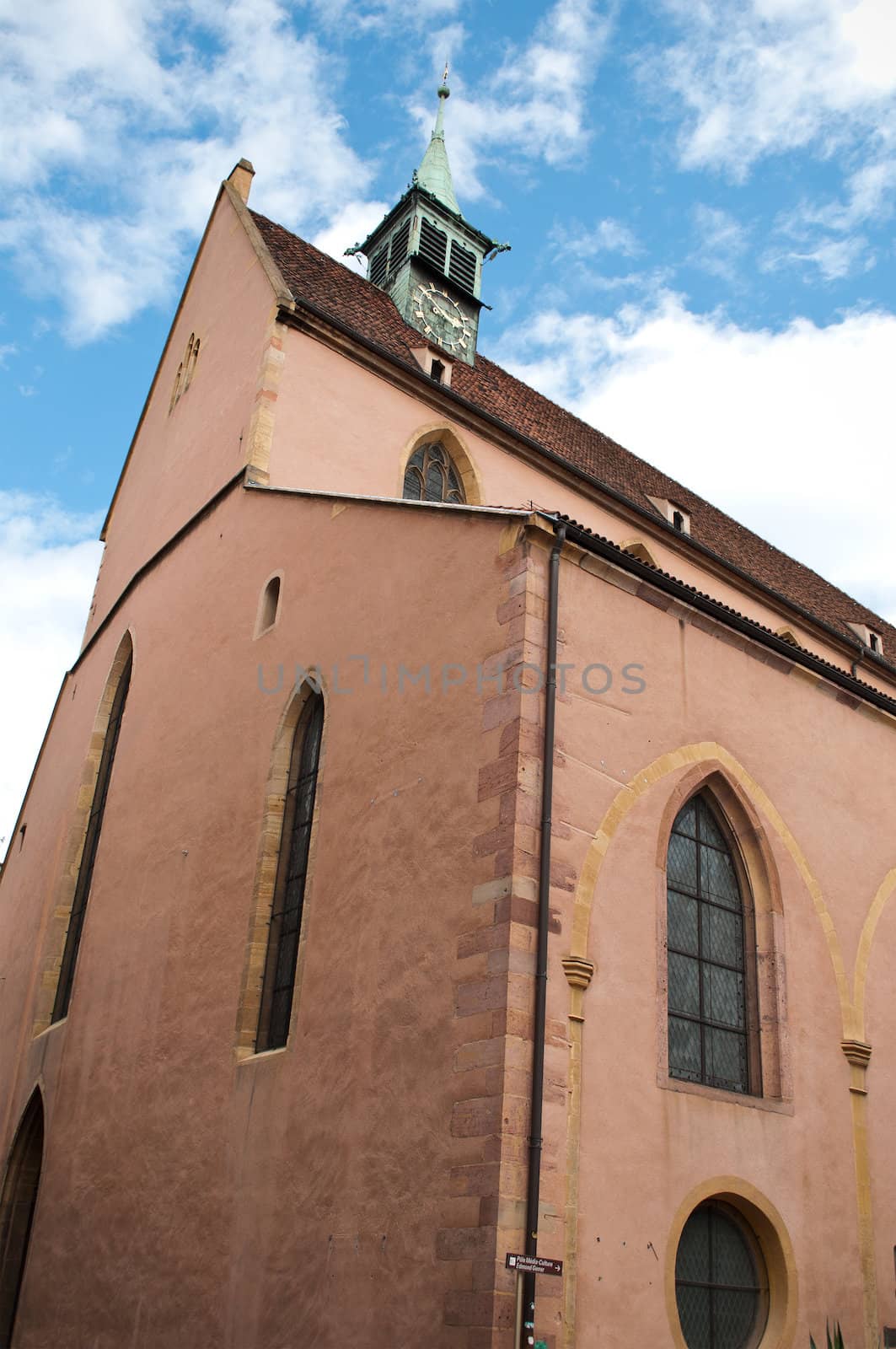 church in Colmar by NeydtStock