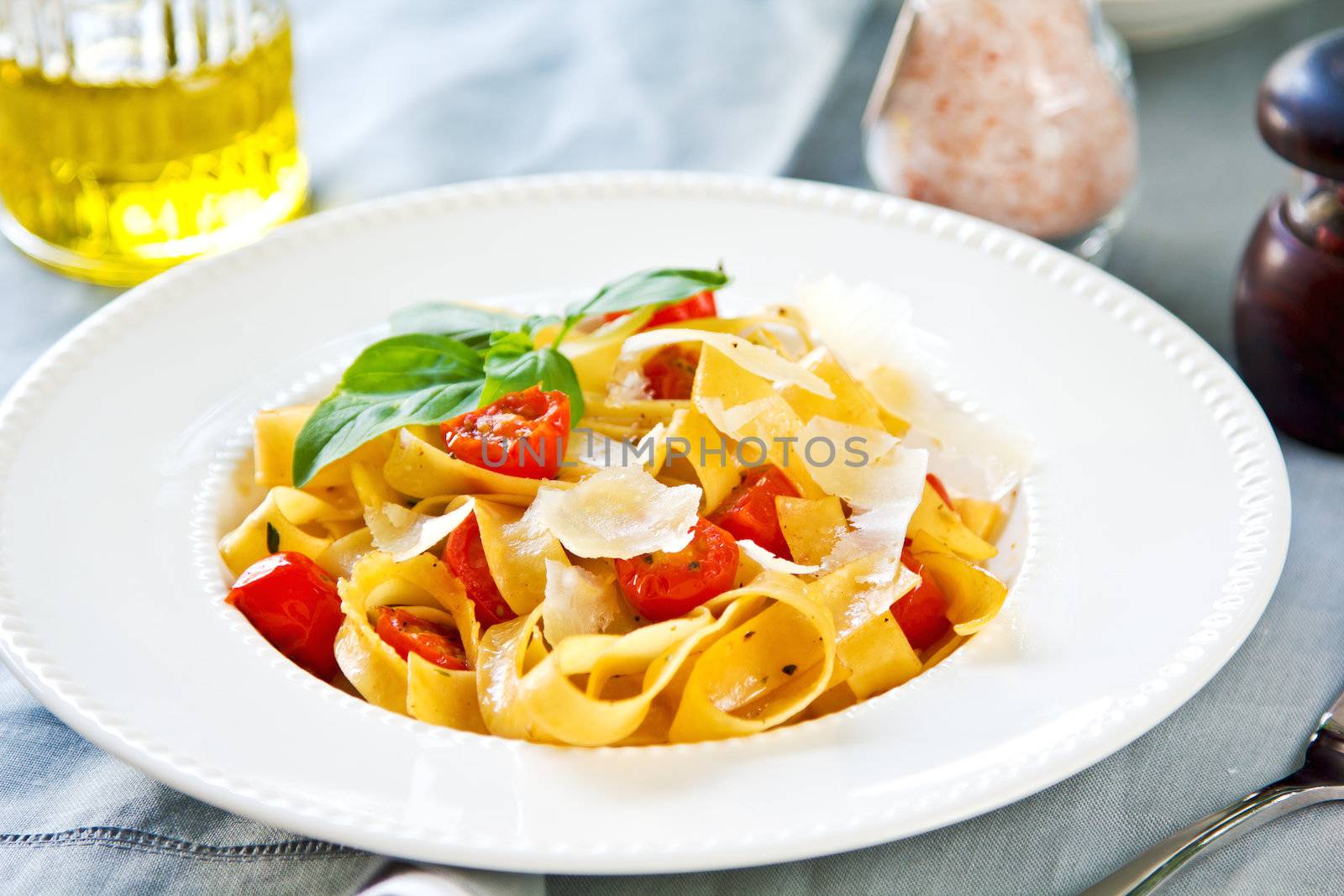 Tagliatelle with cherry tomato and Parmesan on top