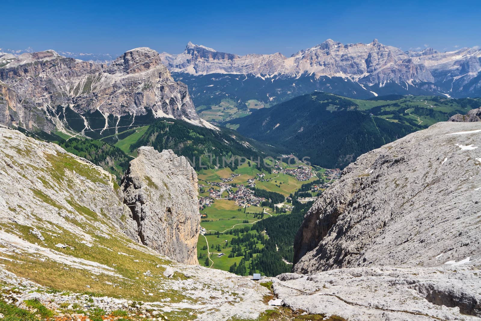 aerial view of Badia Valley with Colfosco village from Sella mount, south tyrol, Italy