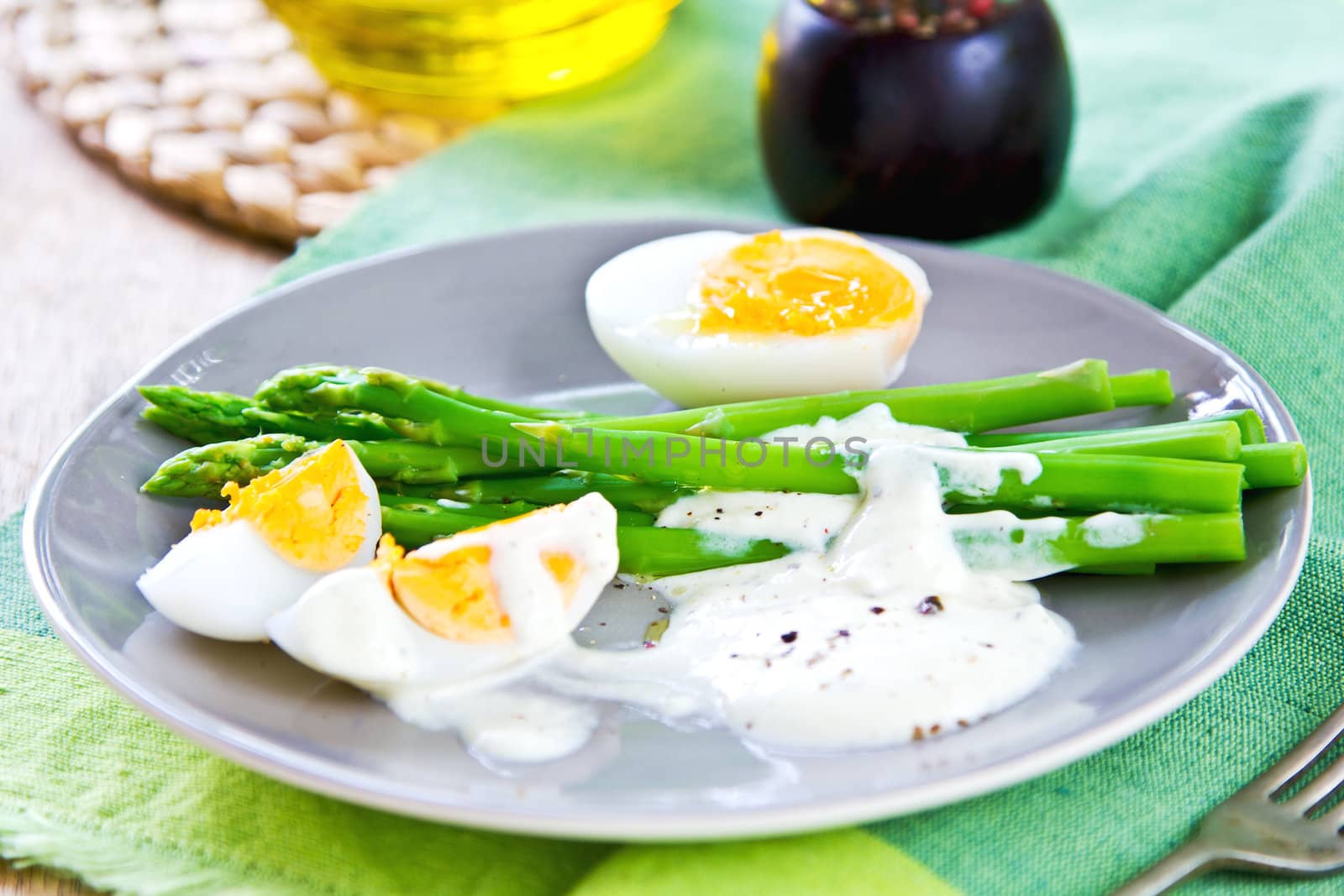 Steamed Asparagus with boiled eggs and sour cream dressing