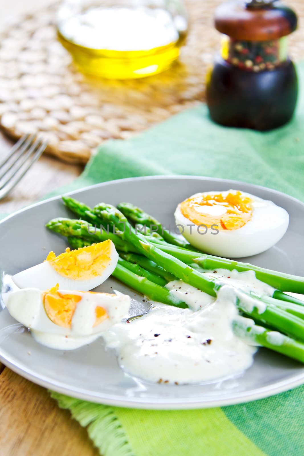 Steamed Asparagus with boiled eggs and sour cream dressing