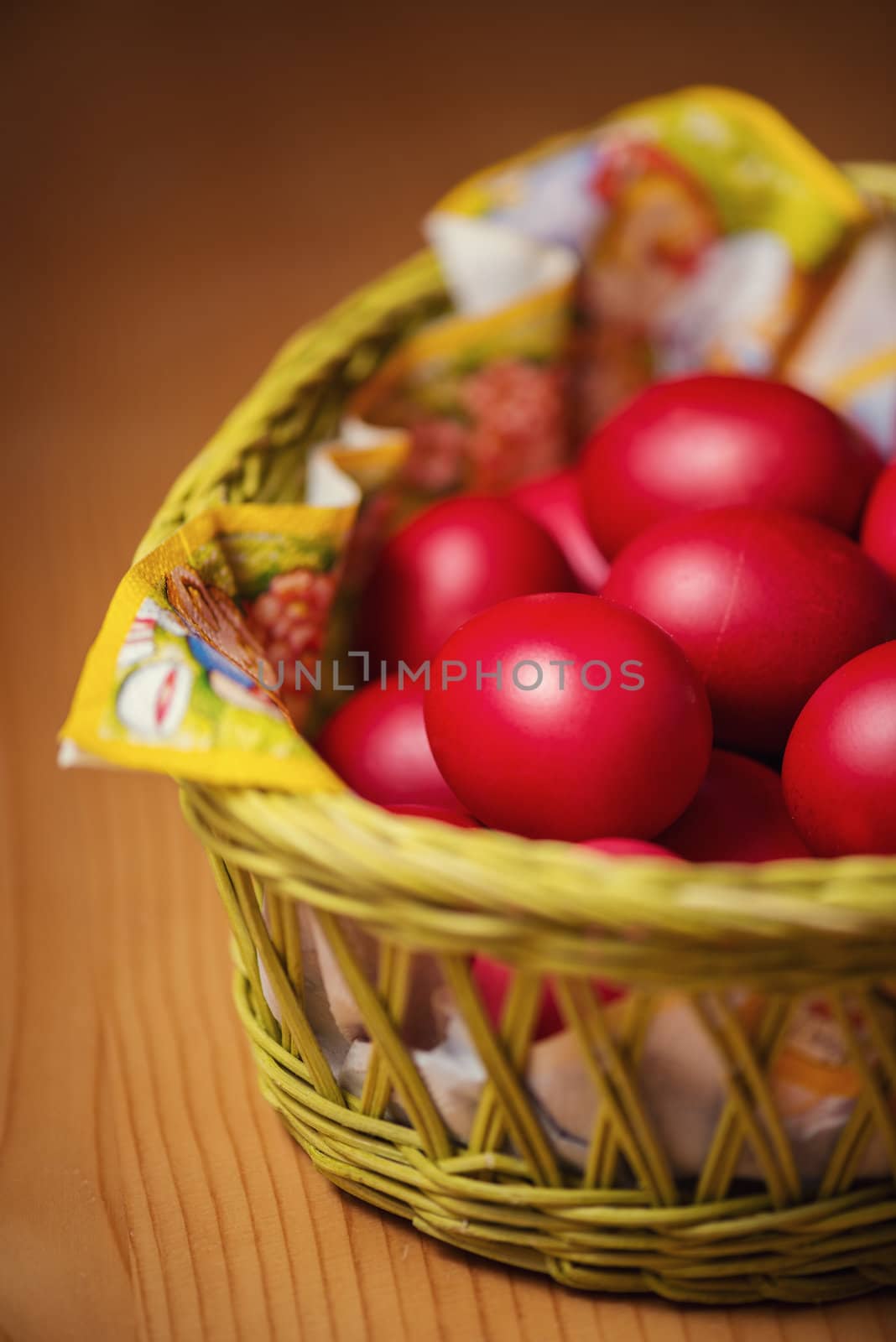 Many of Red Easter Eggs in a Yellow Basket