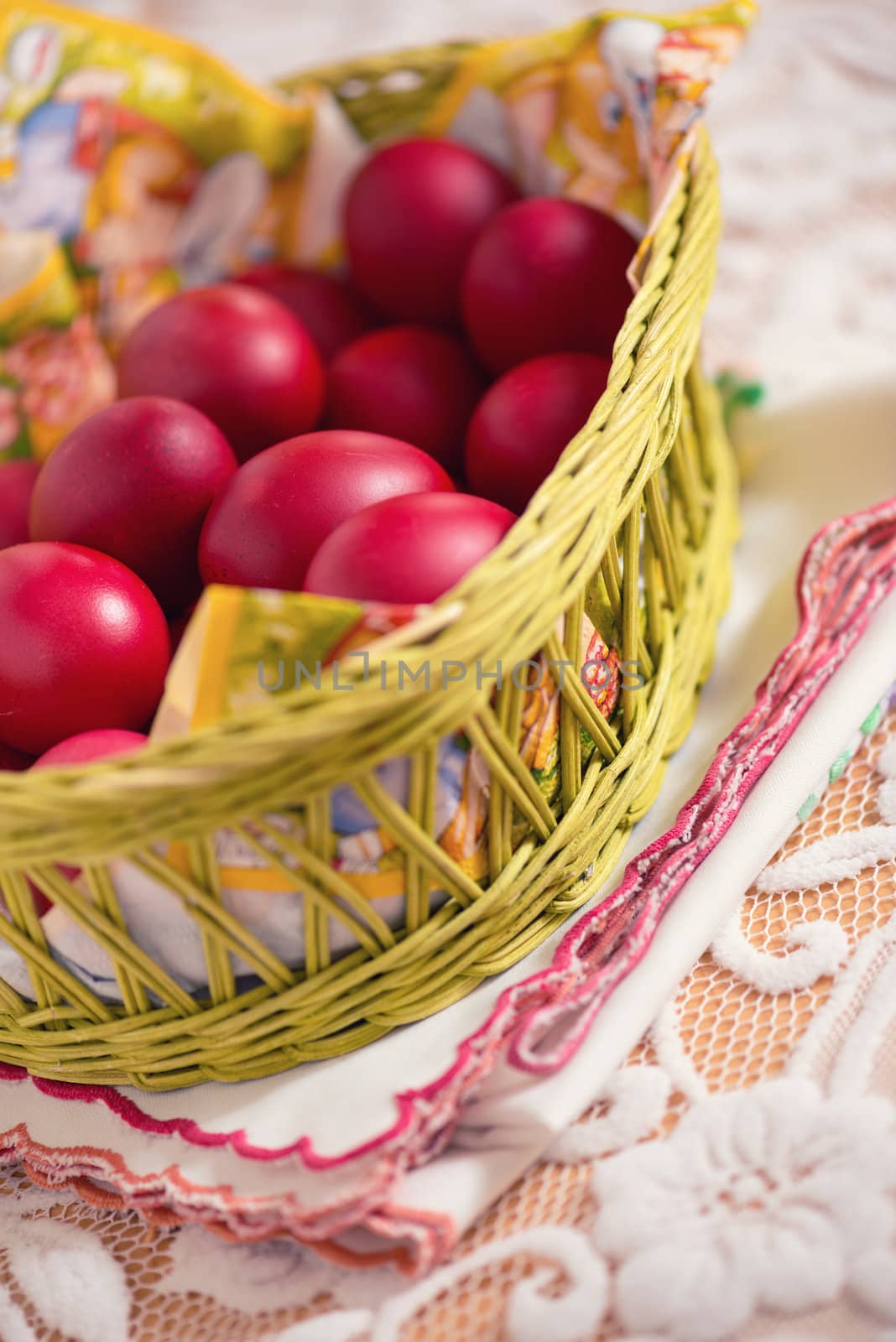Many of Red Easter Eggs in a Yellow Basket