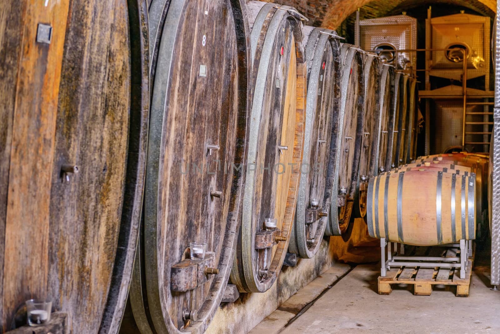 An Old Wine Cellar With Wooden Barrels