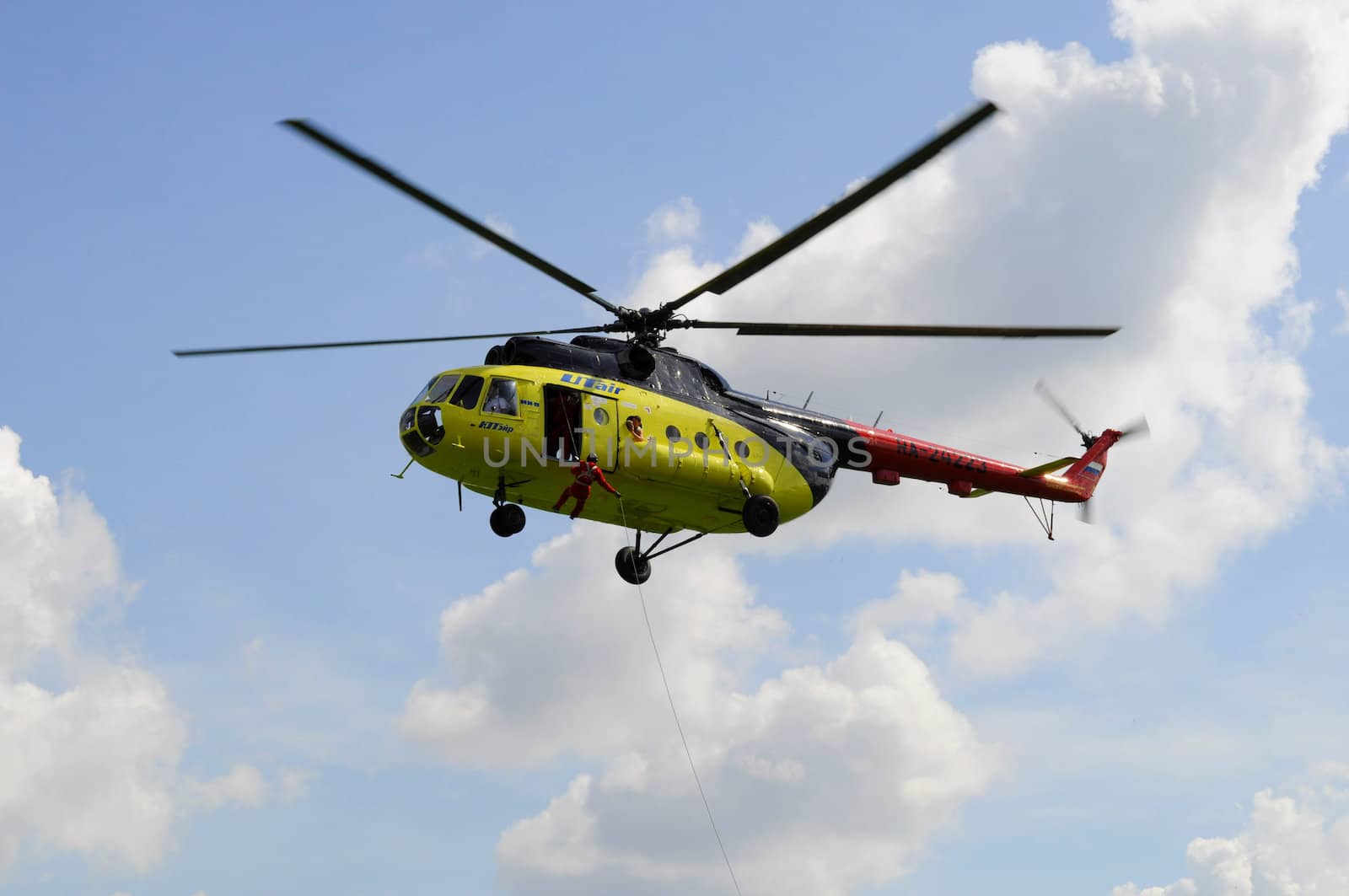 Air show "On a visit at Utair". Tyumen, Russia. 16.08.2014. MI-8 helicopter. Landing of troops