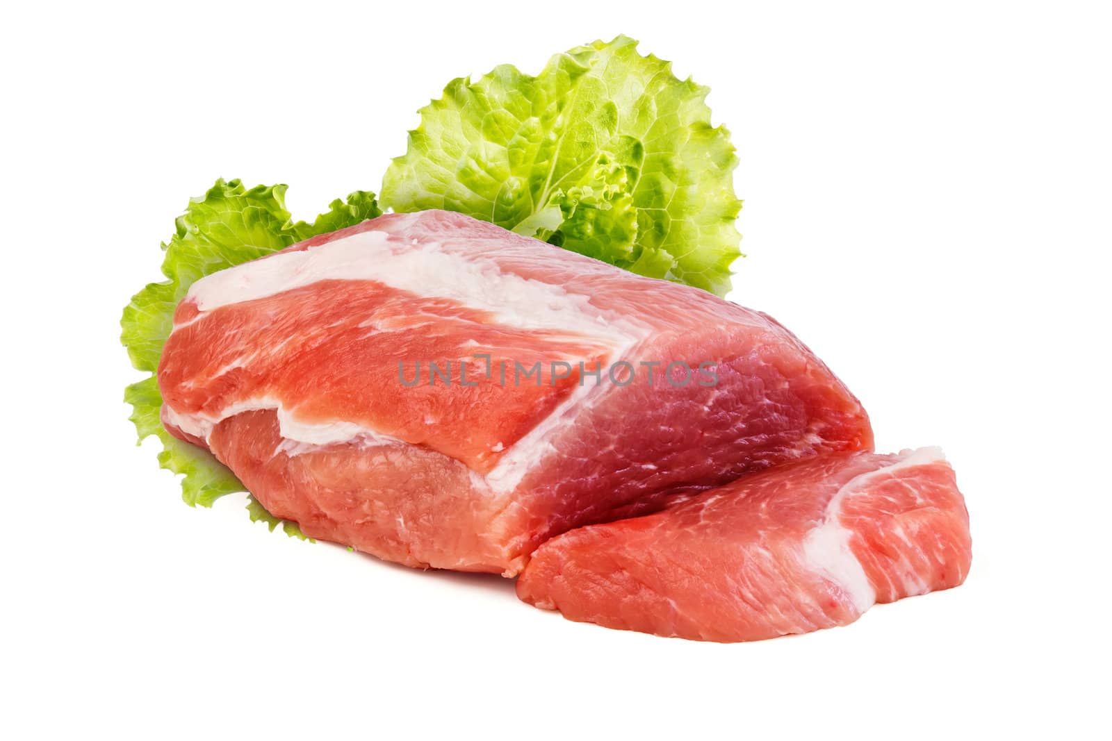 Piece of raw meat and lettuce leaves on white background