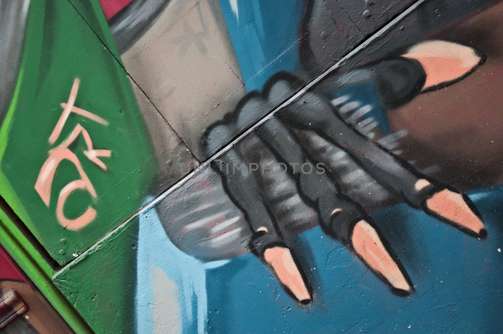 Paris - France April 2013 - urban art - abstract hand by NeydtStock