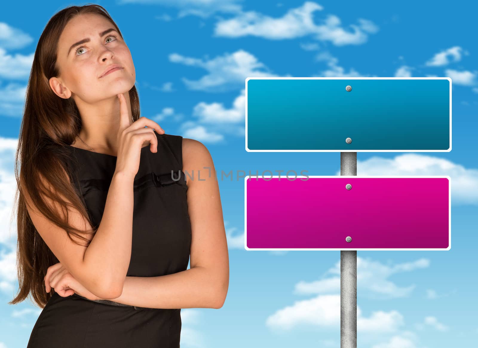 Lost in thought businesswoman. Crossroads road sign as backdrop