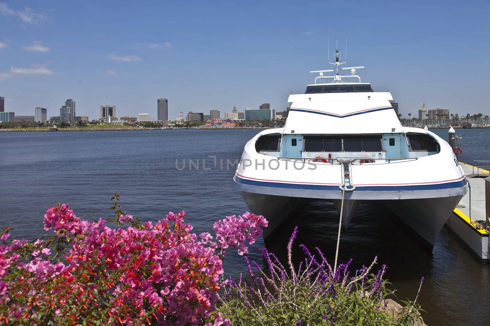 Moored ferry and the Long Beach skyline California.