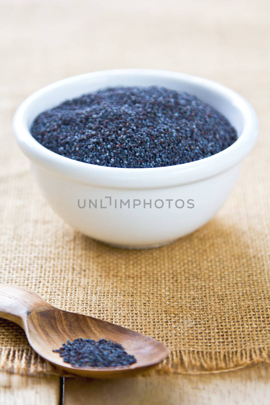 Blue seal Poppy seeds in a white bowl