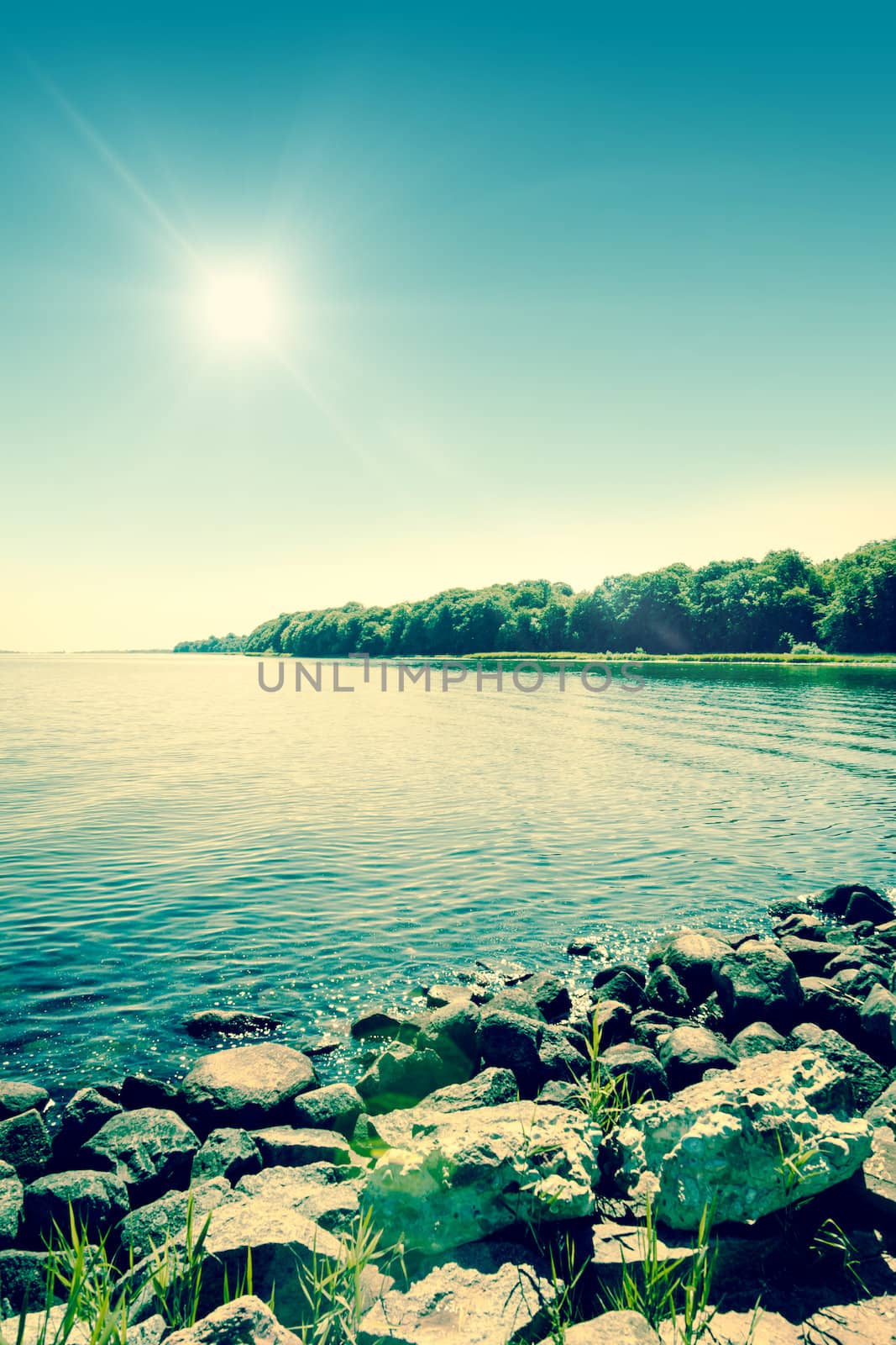 Sunshine at a beautiful lake by Sportactive