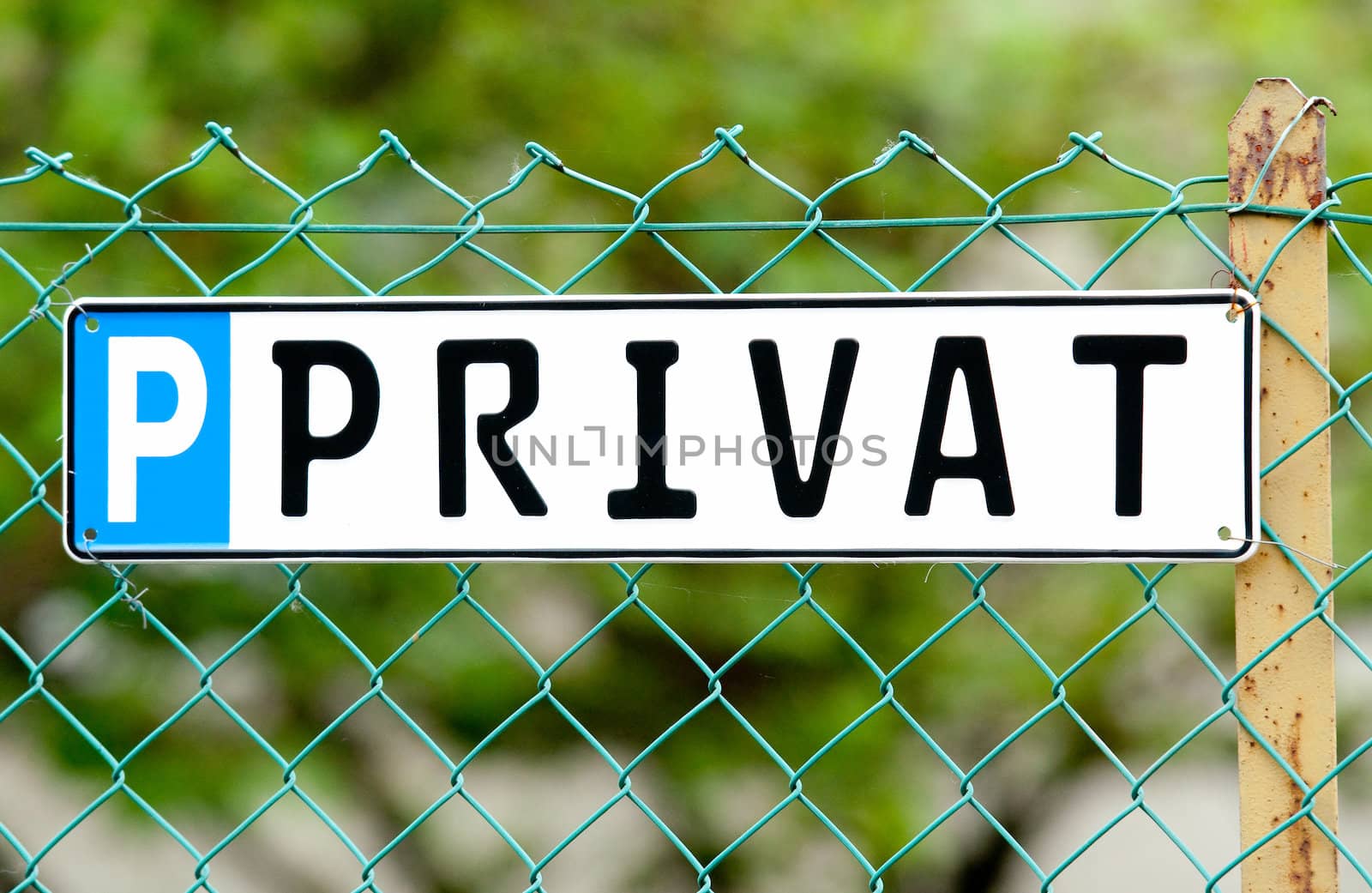 Private Sign on an old green fence