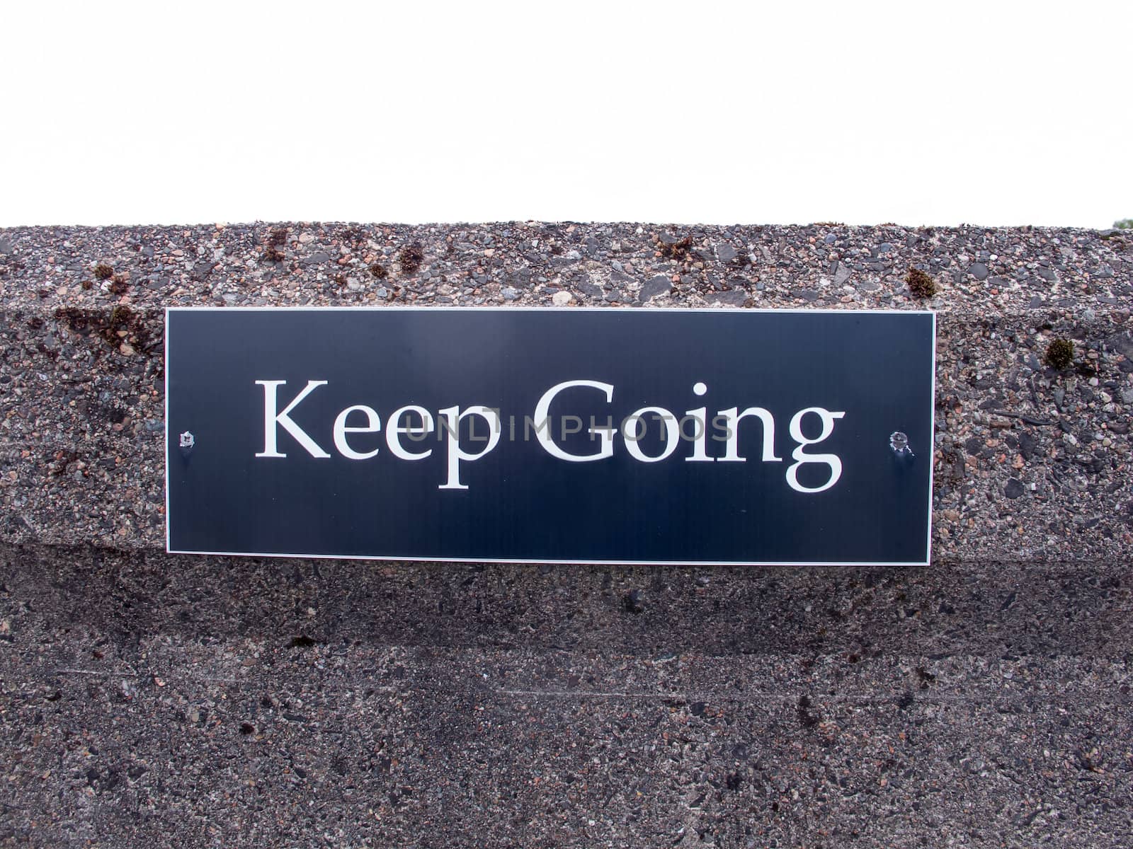 Sign with words "Keep Going"