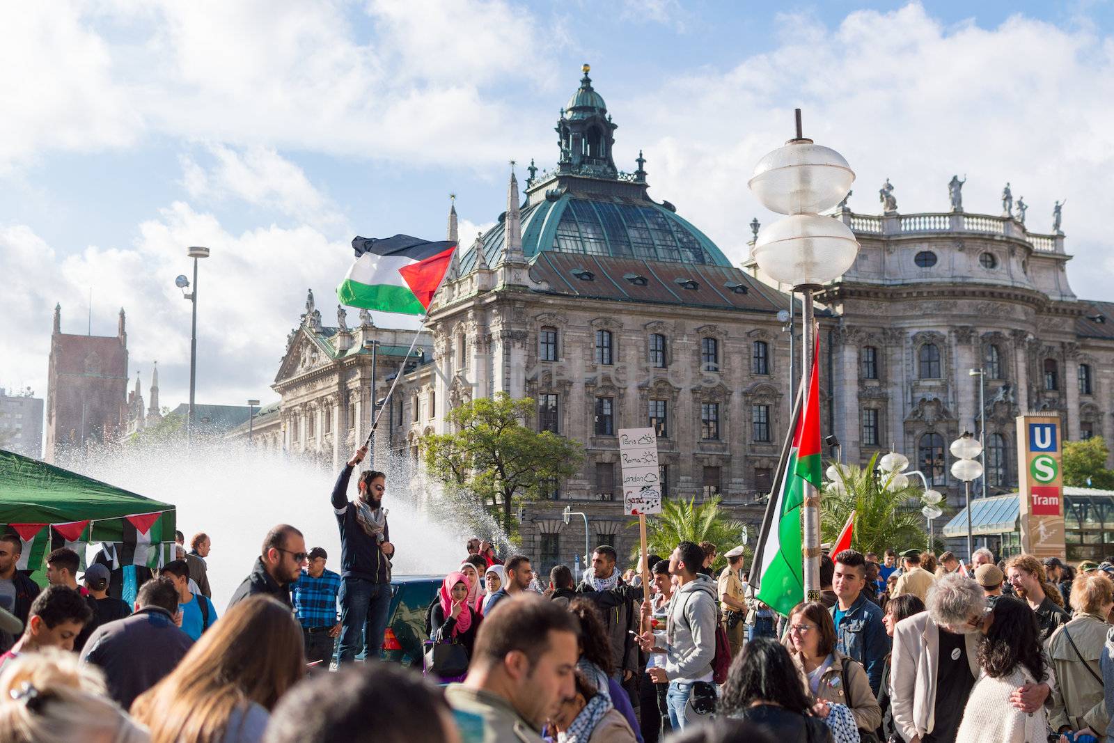 MUNICH, GERMANY - AUGUST 16, 2014: Demonstration in support of Palestine in the center of Europe. European activists demand the cessation of hostilities in Gaza Strip.