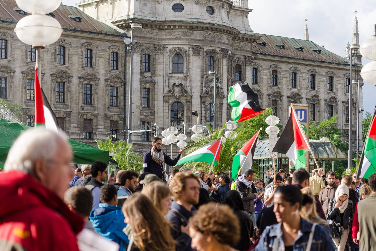 MUNICH, GERMANY - AUGUST 16, 2014: A rally against the war in Gaza. Protesters demand to stop the shelling of Gaza and Israel withdraw from the occupied Palestinian territories.