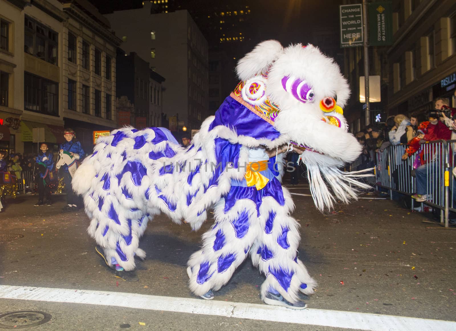 SAN FRANCISCO - FEB 15 : An unidentified participants in a Lion dance at the Chinese New Year Parade in San Francisco , California on February 15 2014 , It is the largest Asian event in North America 