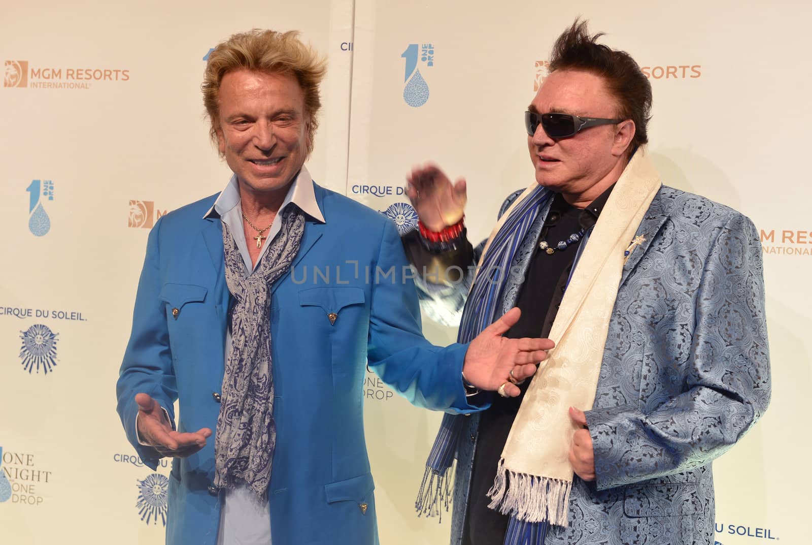 LAS VEGAS - MARCH 21: Former magicians Siegfried (L) and Roy arrives at Cirque du Soleil's annual 'One Night for One Drop' at the Mandalay Bay Resort and Casino on March 21, 2014 in Las Vegas, Nevada