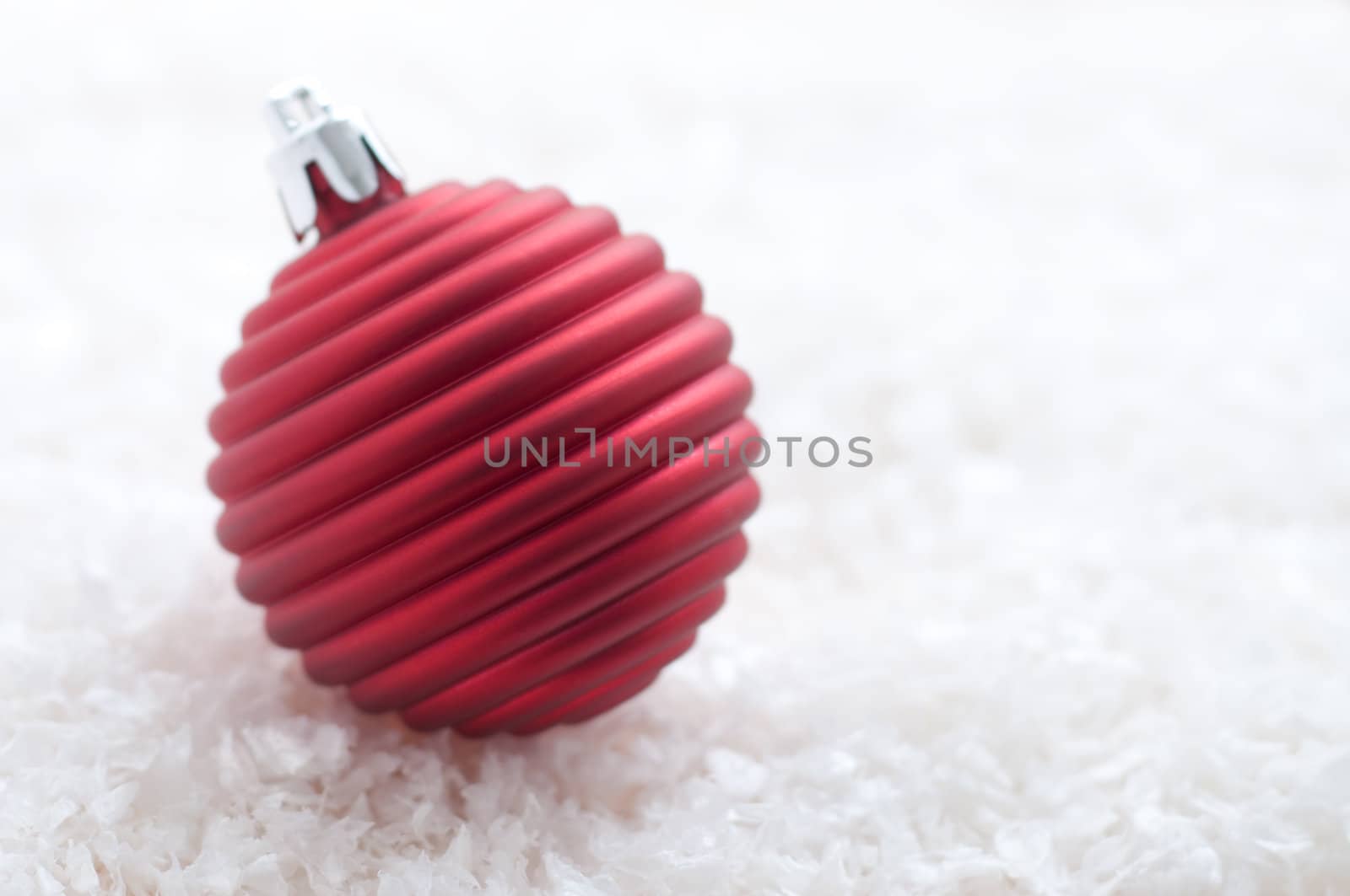 Red christmas ornament with copytext