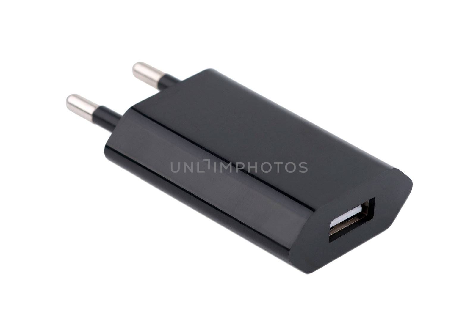 Black USB charger device isolated on white